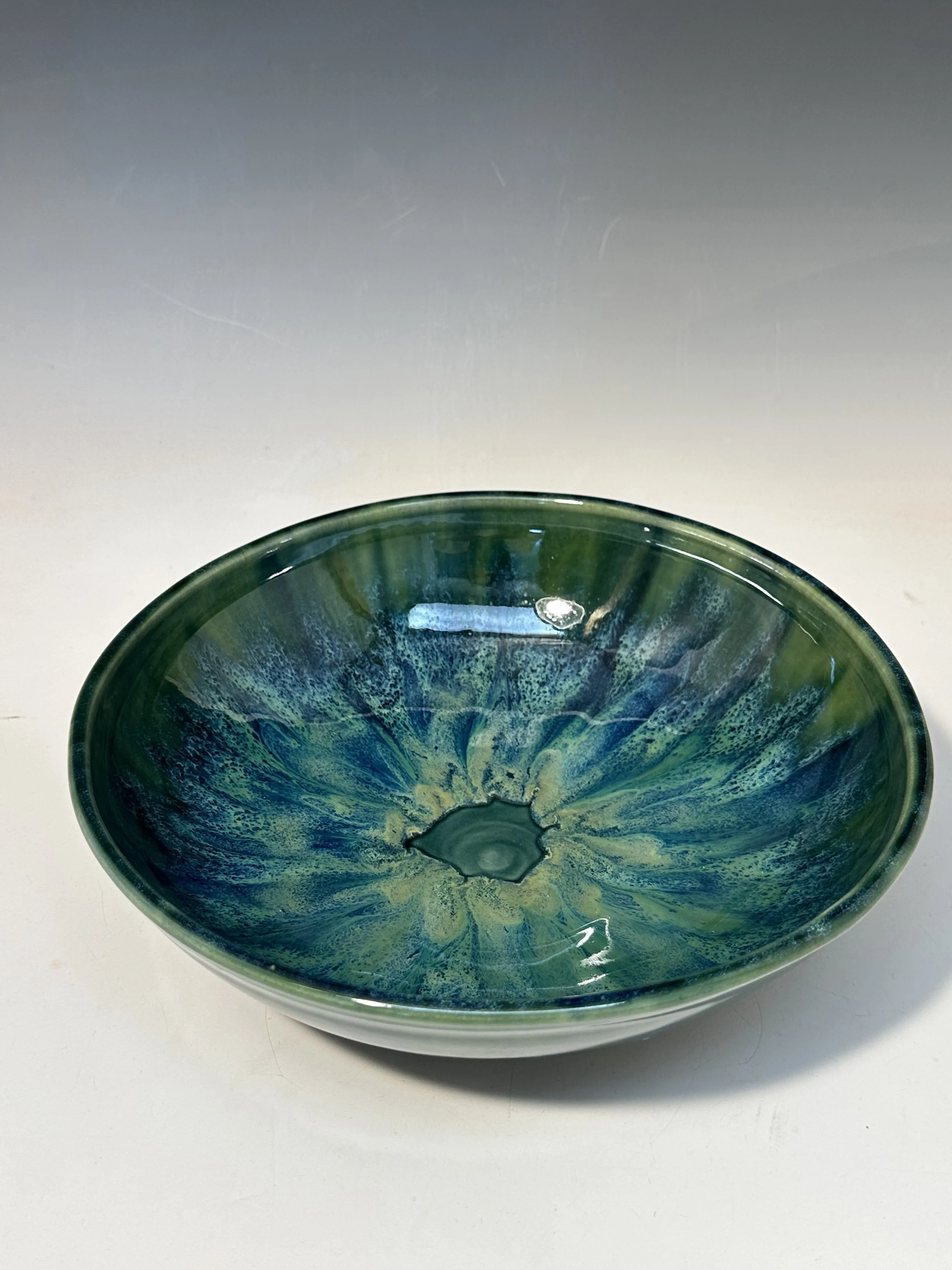 Another experiment with layering of glazes.  This bowl is flatter - about 10" wide and 3 ish high.