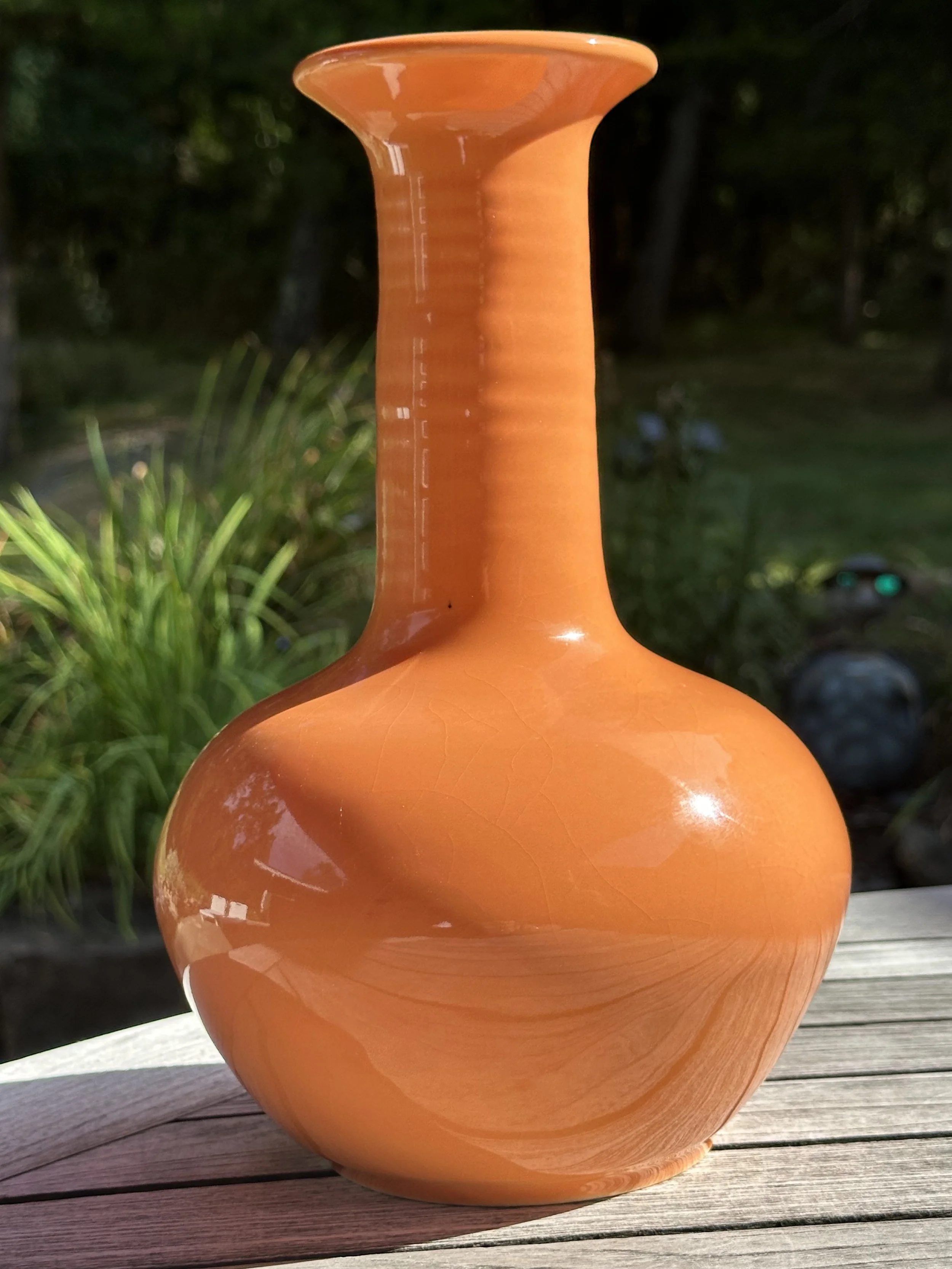 Ideal for long stemmed grasses.  Love the tangerine.  This is about 12 inches high.