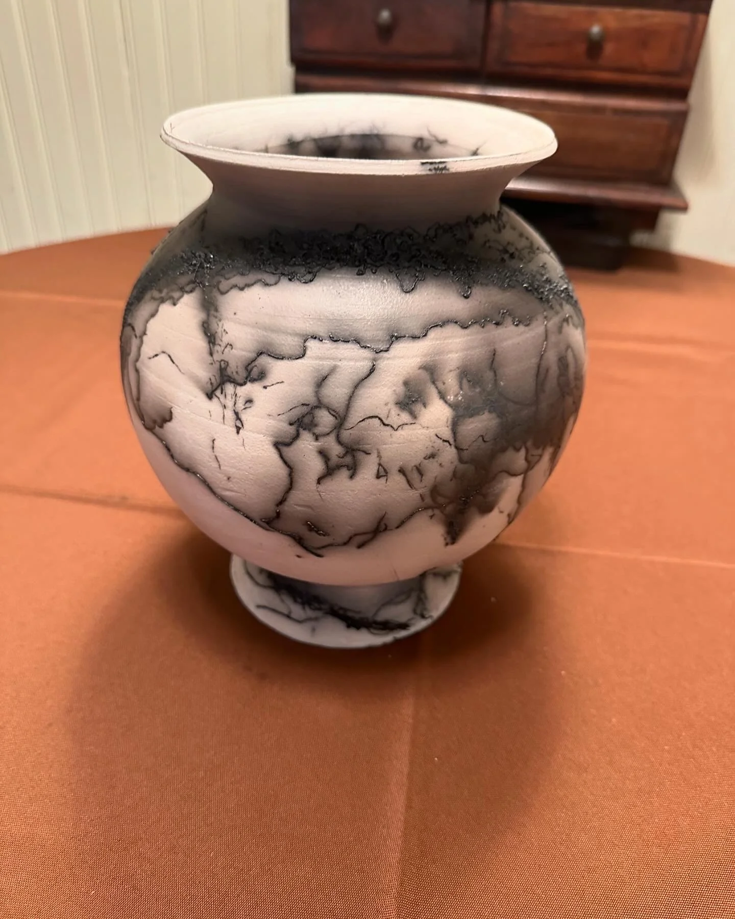 Horse-hair decorated Raku vase (10").  Weirdly spooky.  Not vitrified.