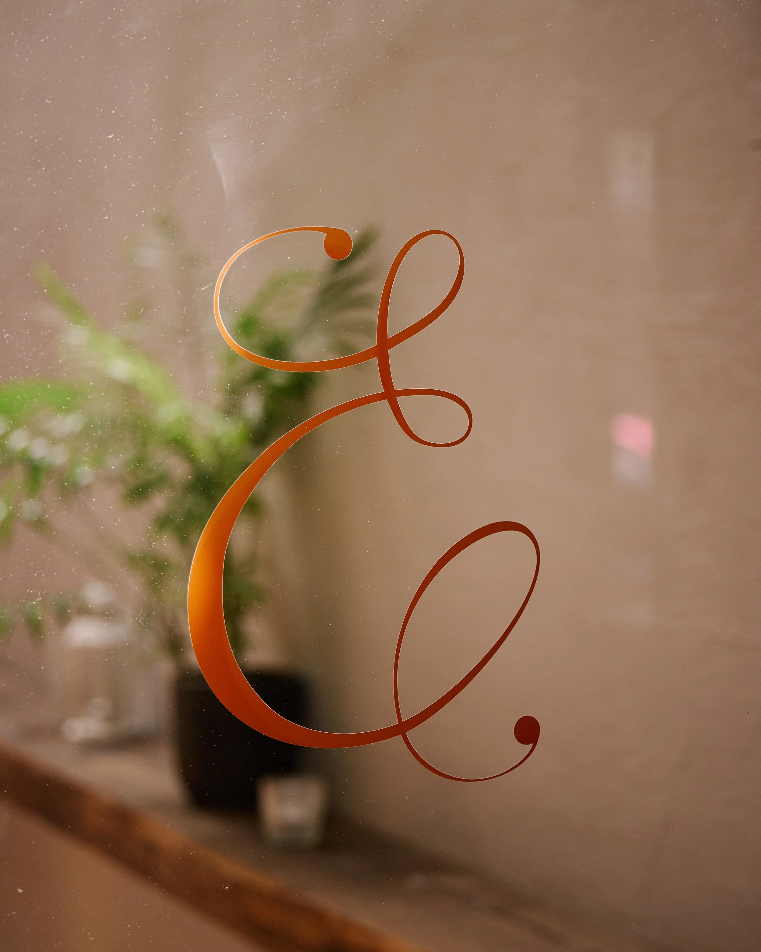 Estelle logo on the door to the courtyard. 