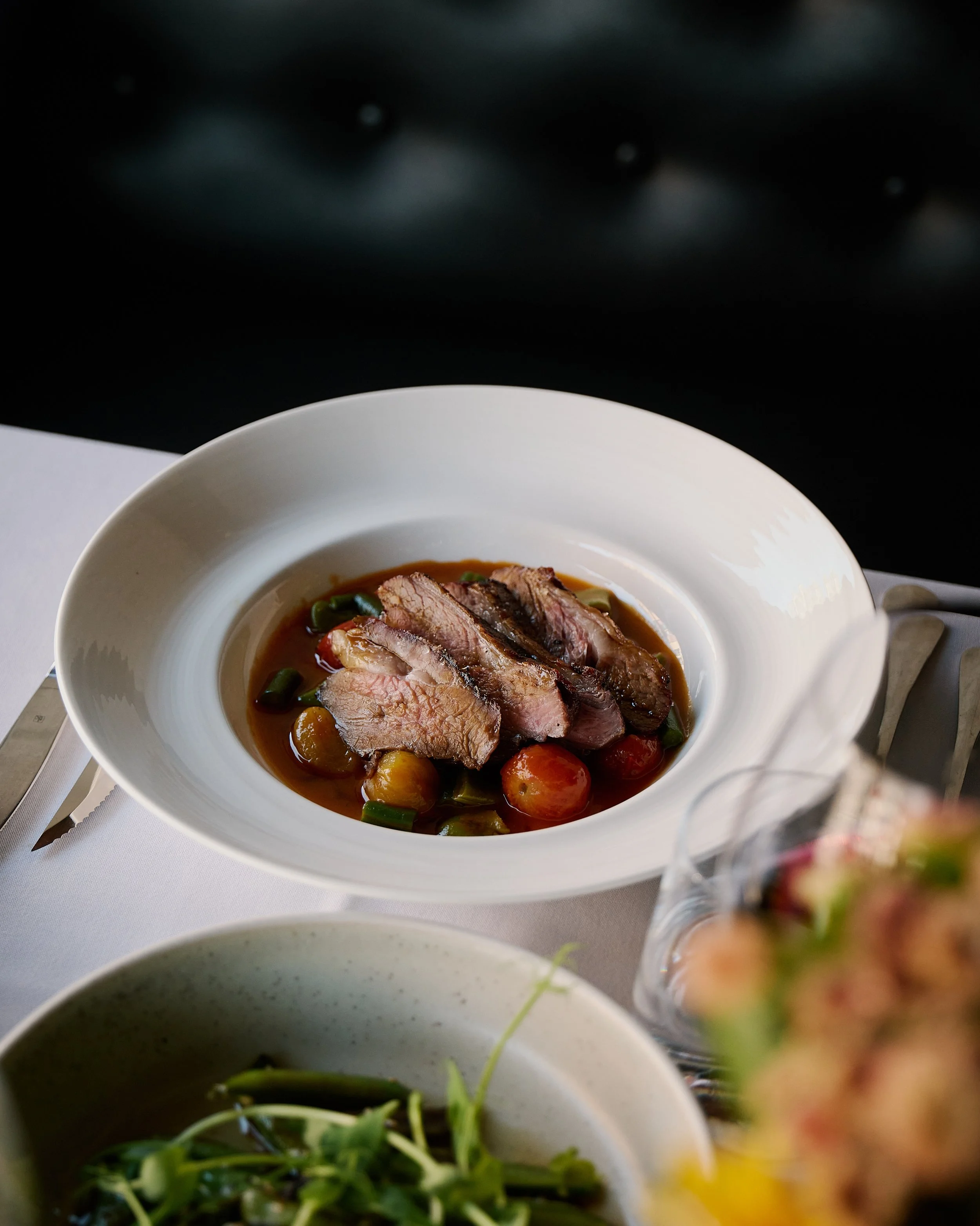 Lamb rump, minestrone of summer beans, confit tomato