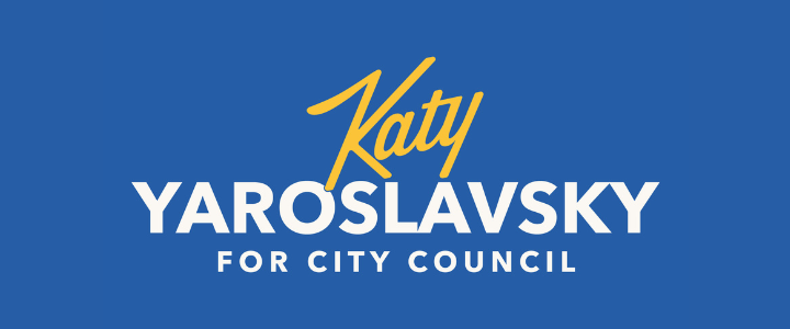 Campaign sign for Katy Yaroslavsky for City Council with blue background and yellow and white text.