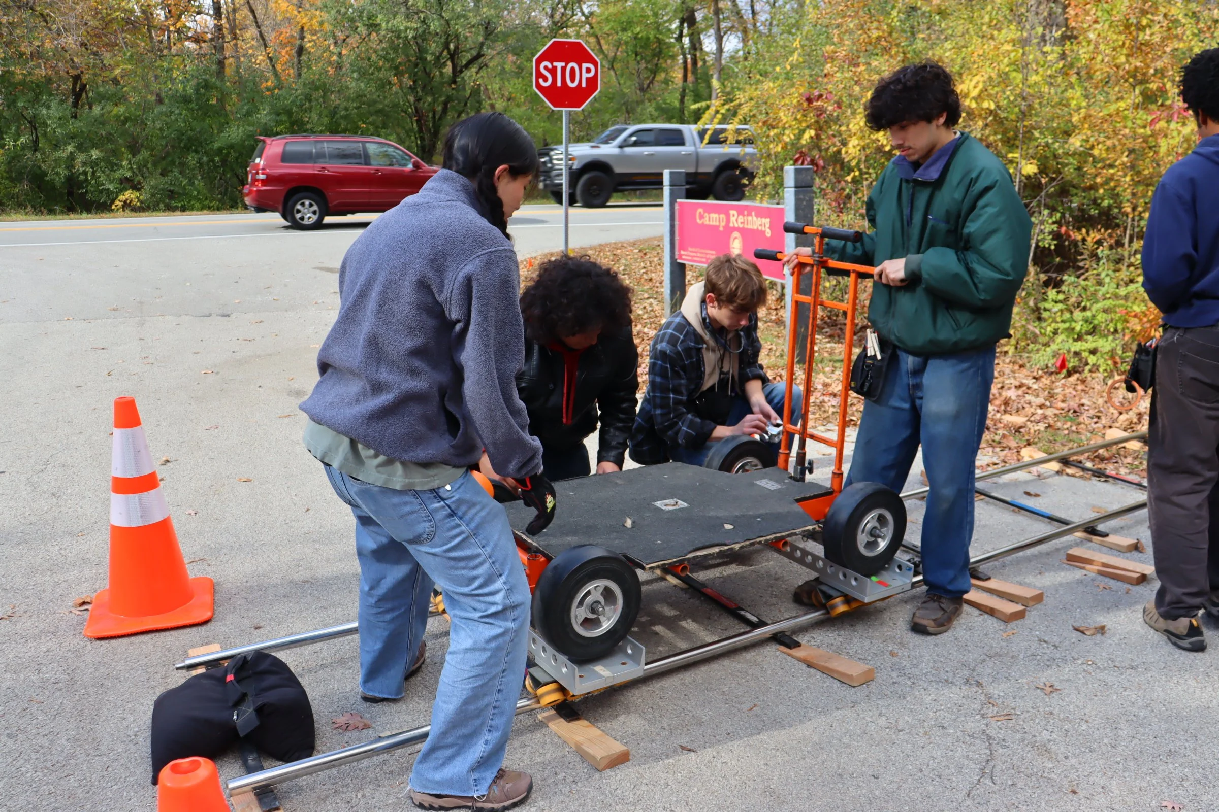 Crew setting up a dolly shot outside on day 1 of principle photography 