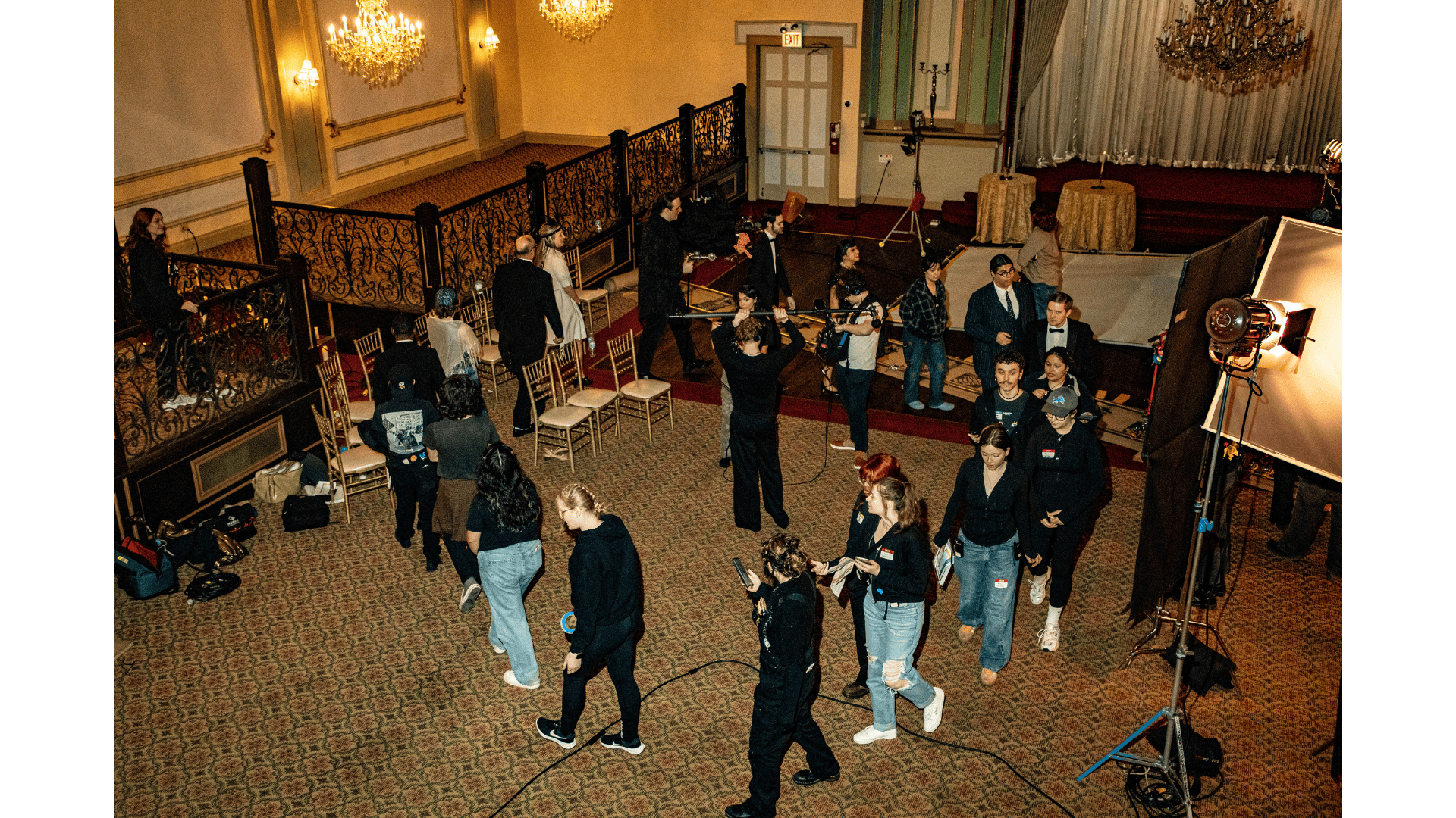 Cast and crew creating footsteps to be able to use during post 