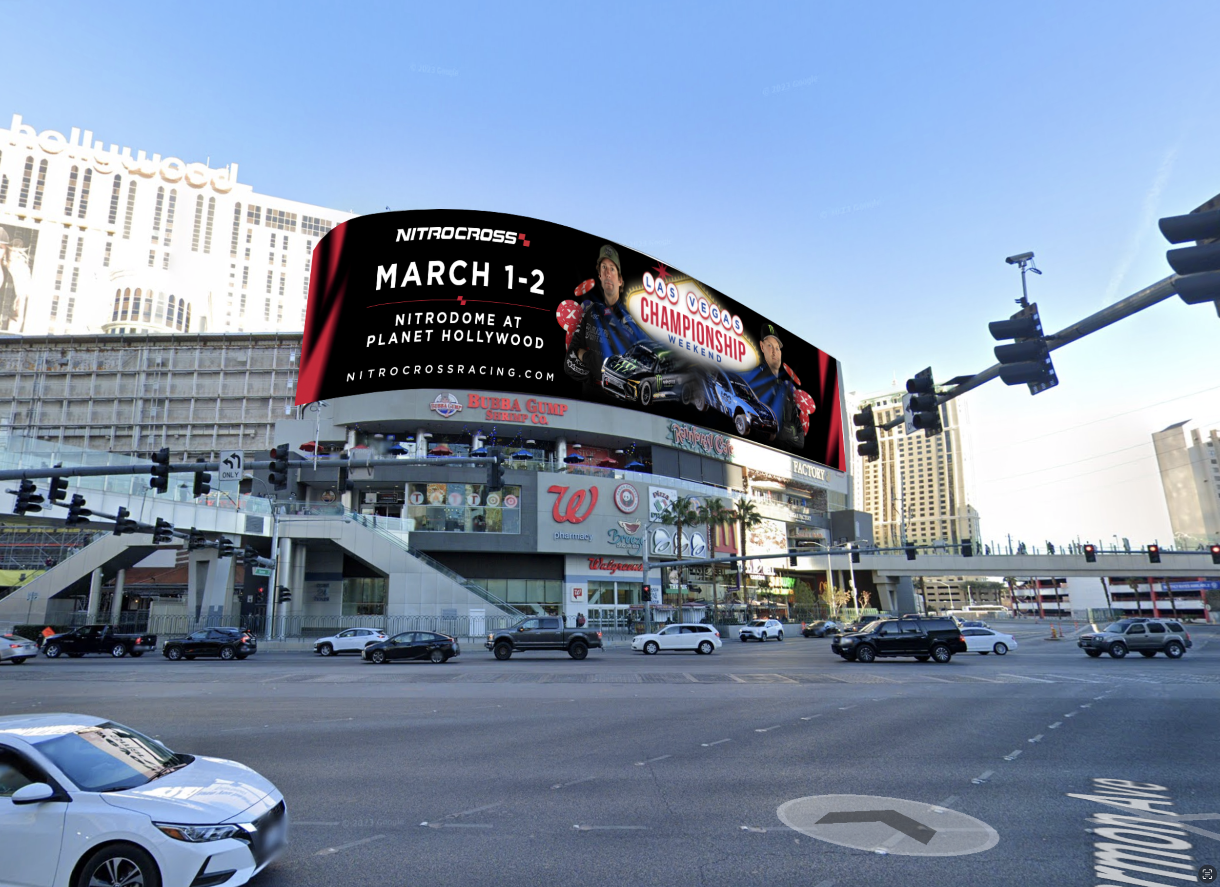 Digital billboard advertising a NitroCross racing event at Planet Hollywood in Las Vegas, scheduled for March 1-2, featuring cars and drivers, with a cityscape background