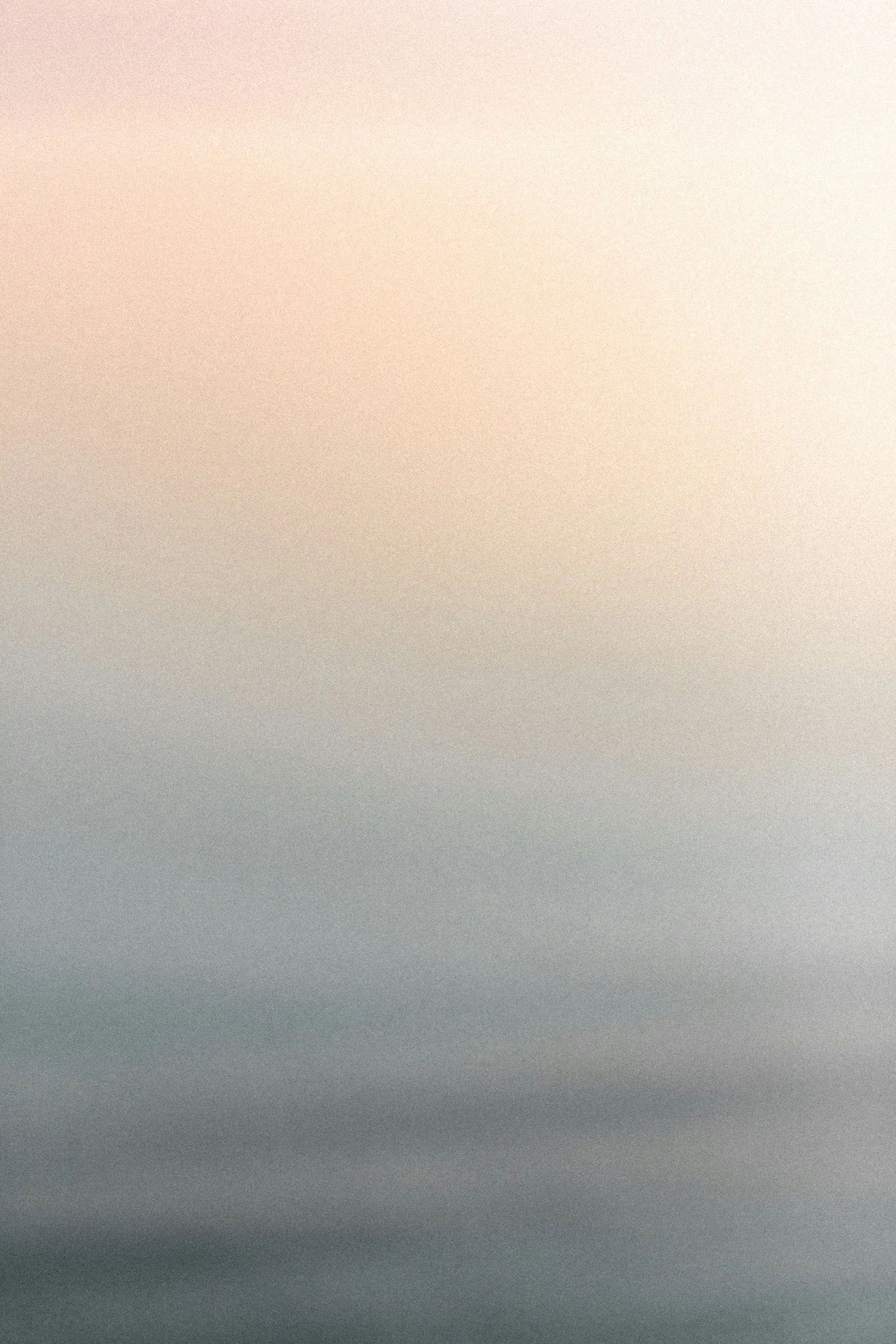 An abstract gradient background with shades of pink, peach, and gray.