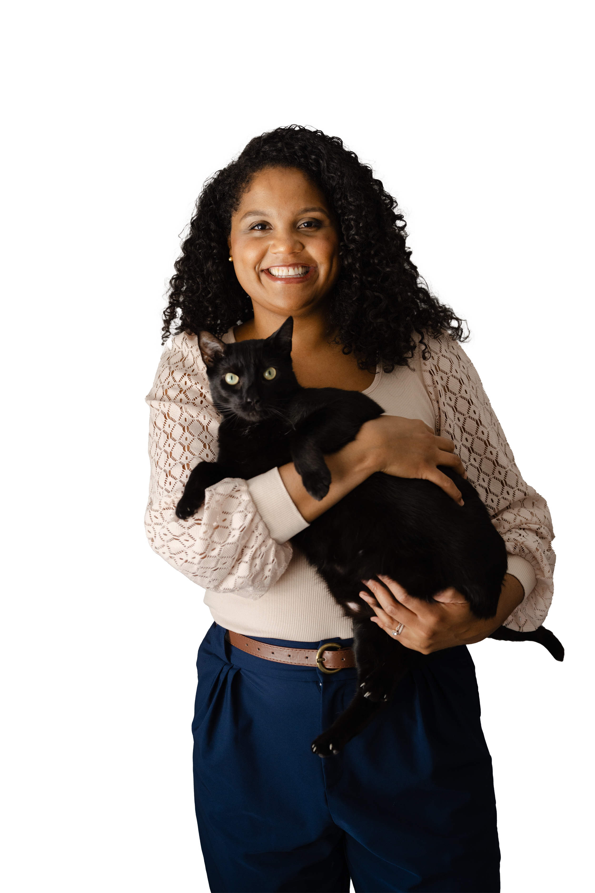 A Professional Therapist holding her pet, a black cat