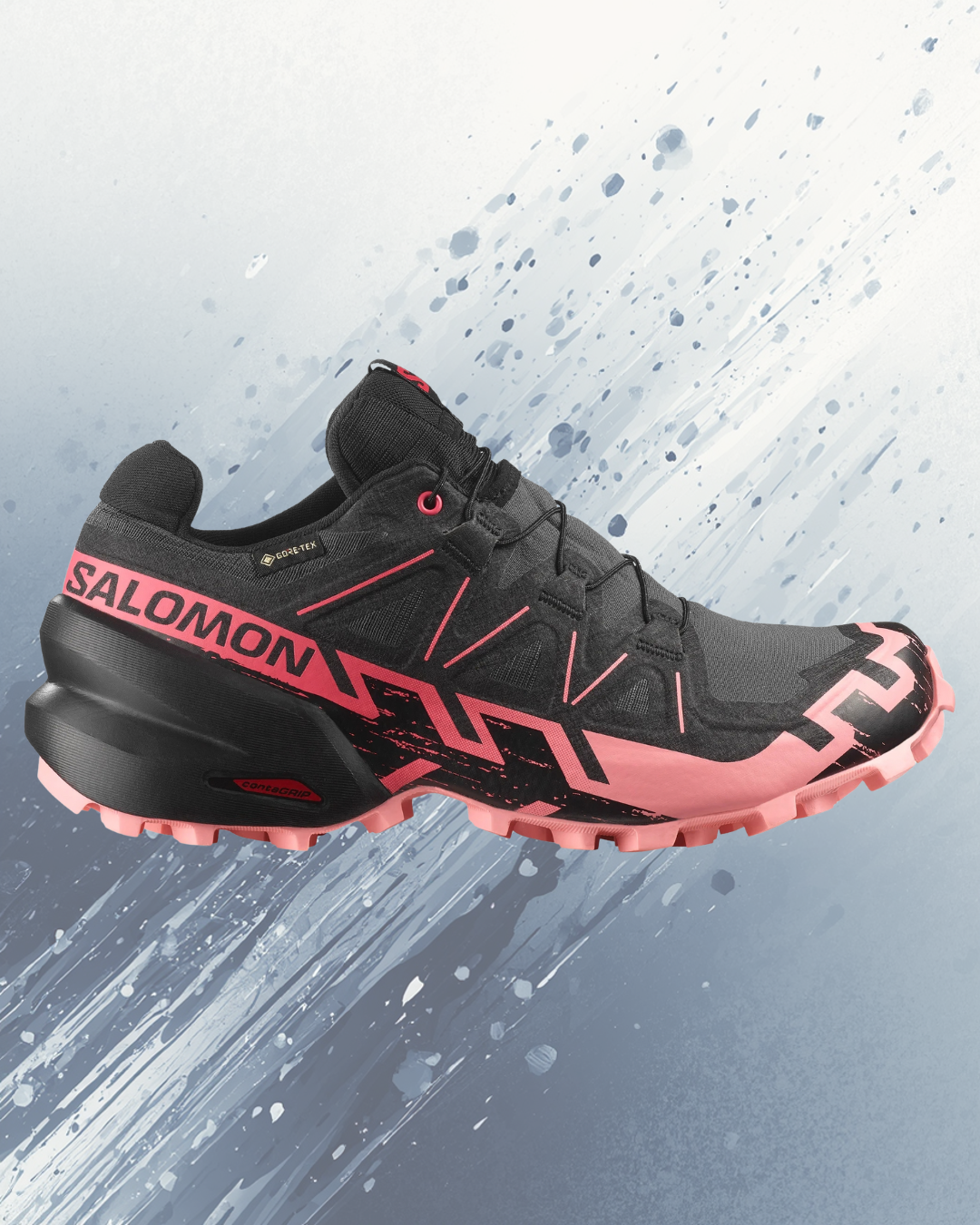 Black and pink Salomon trail running shoe with GORE-TEX, isolated on a dynamic, abstract background with splashes of white and blue.