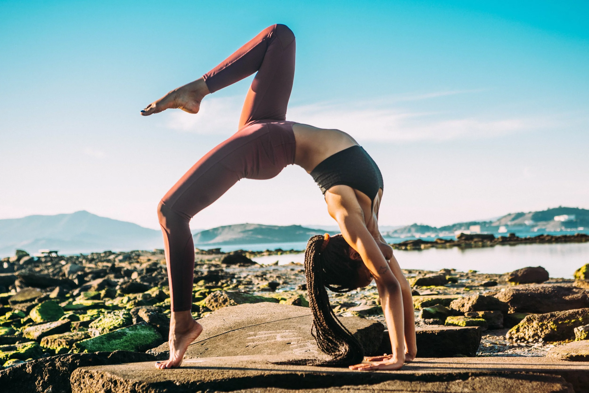 woman doing yoga | The Sectional