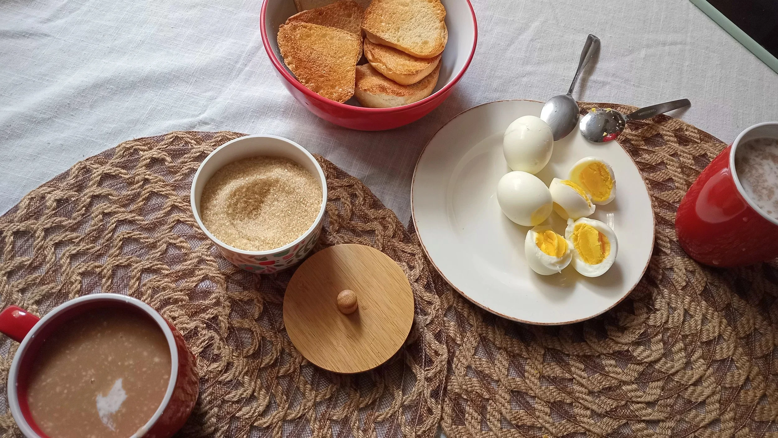 boiled eggs, toast, coffee with almond milk, warm breakfast