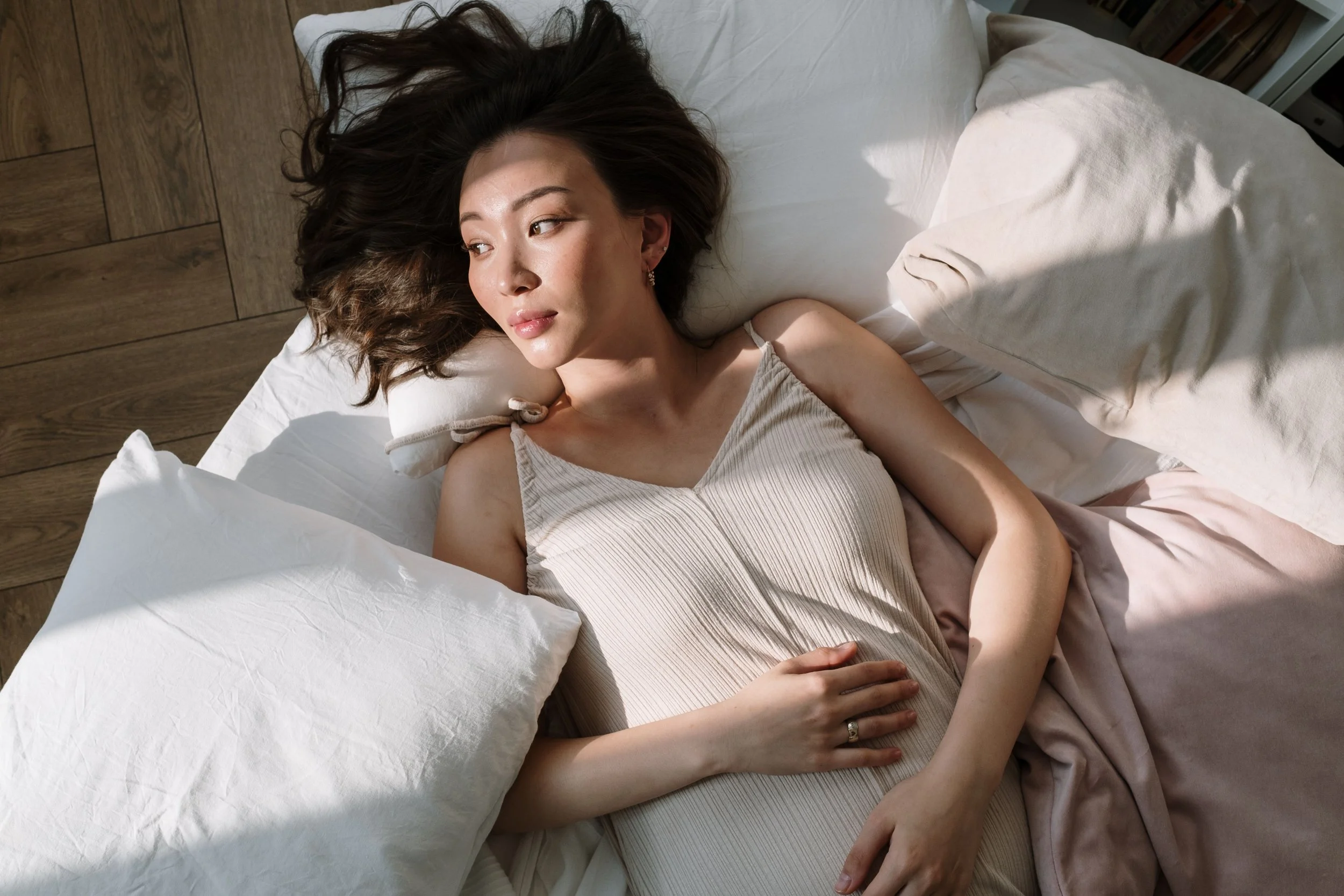 woman on period, cycle syncing | The Sectional