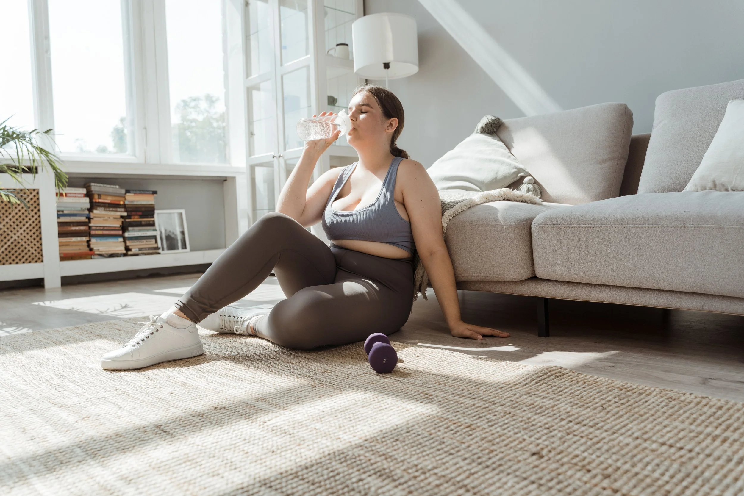 woman getting movement while on period | The Sectional