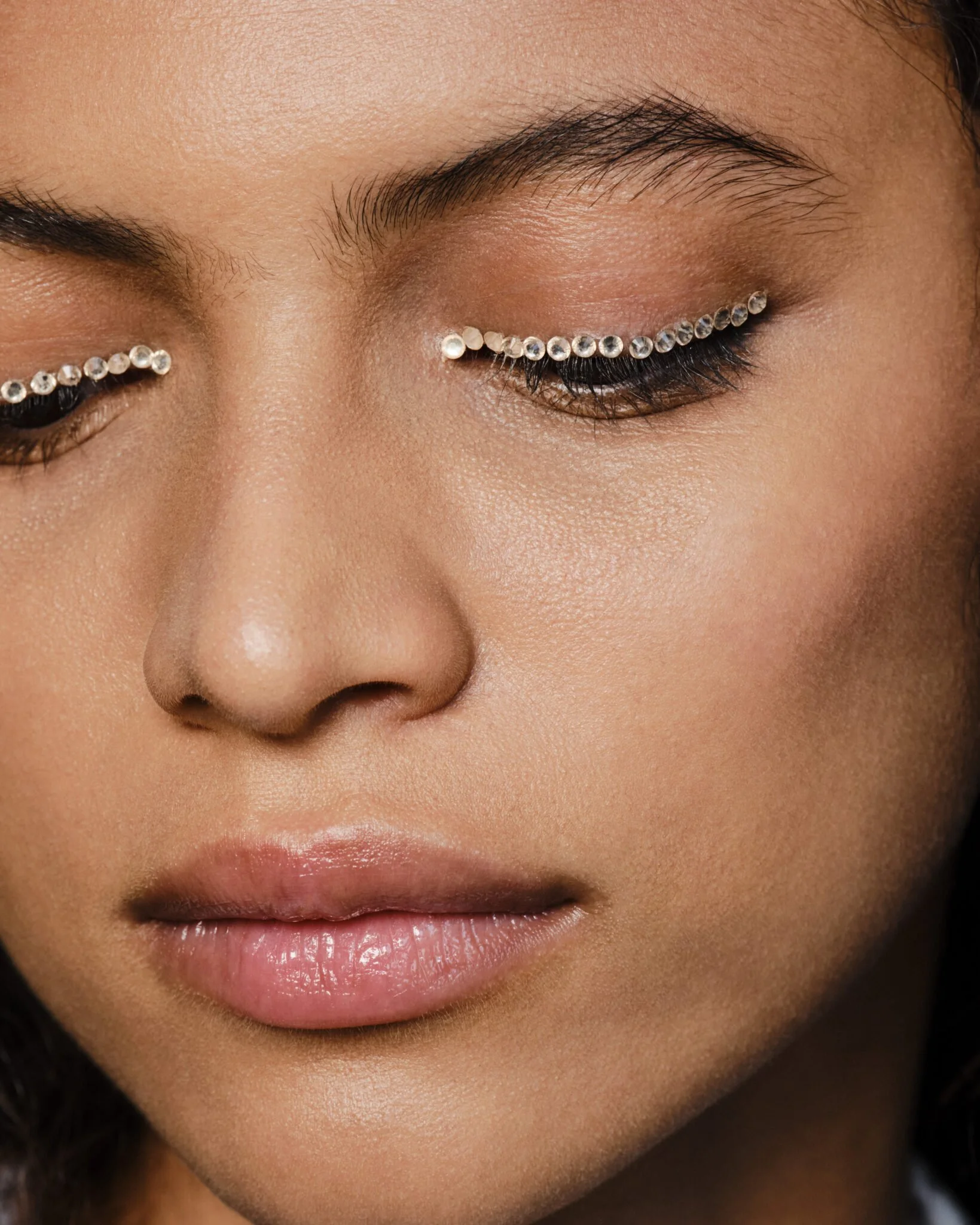 Embellished eye makeup at Dior 2027 Cruise - thesectional.com