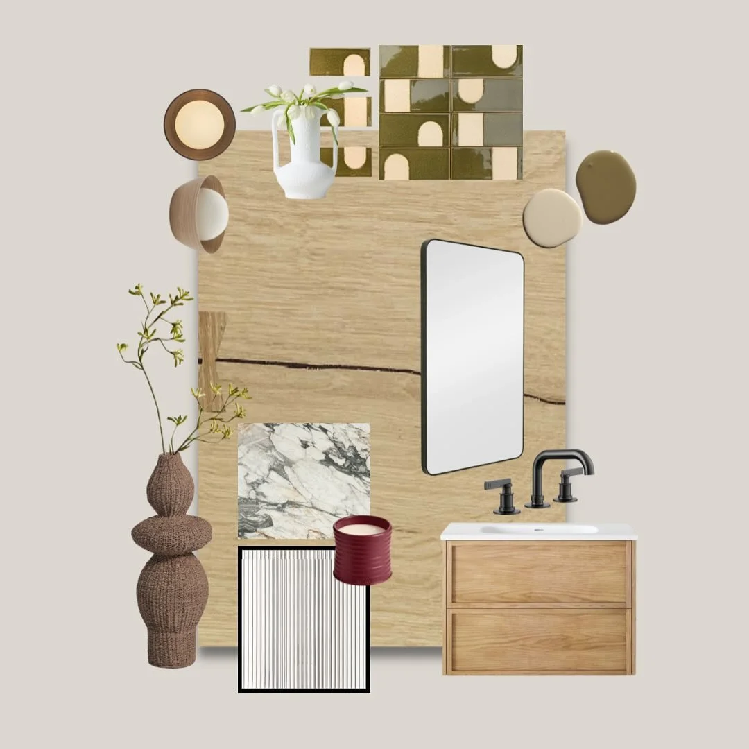 A moody yet grounded take on a bathroom refresh. Soft oak wood tones, deep olive green tiles, and creamy neutrals set a warm, organic foundation. 

The black fixtures provide contrast, while the marble brings in some natural movement. Woven textures 