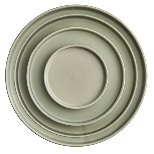 A set of nested greenish-beige plates, with round and flat shapes, arranged inside each other.