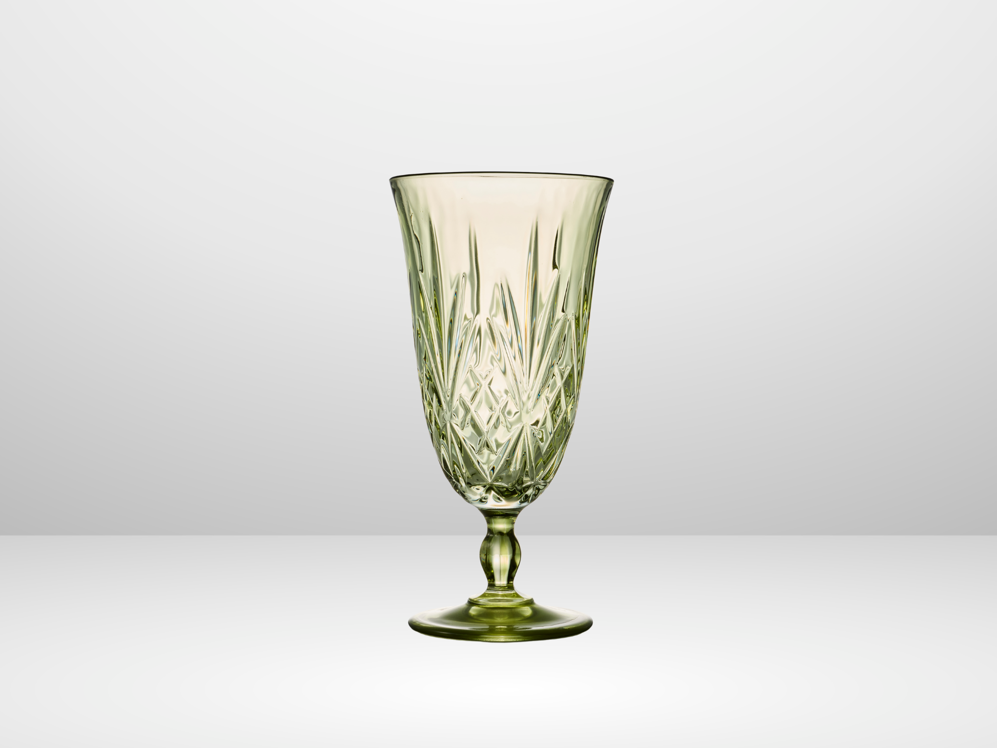 Soft green water goblet with beautiful etched detailing