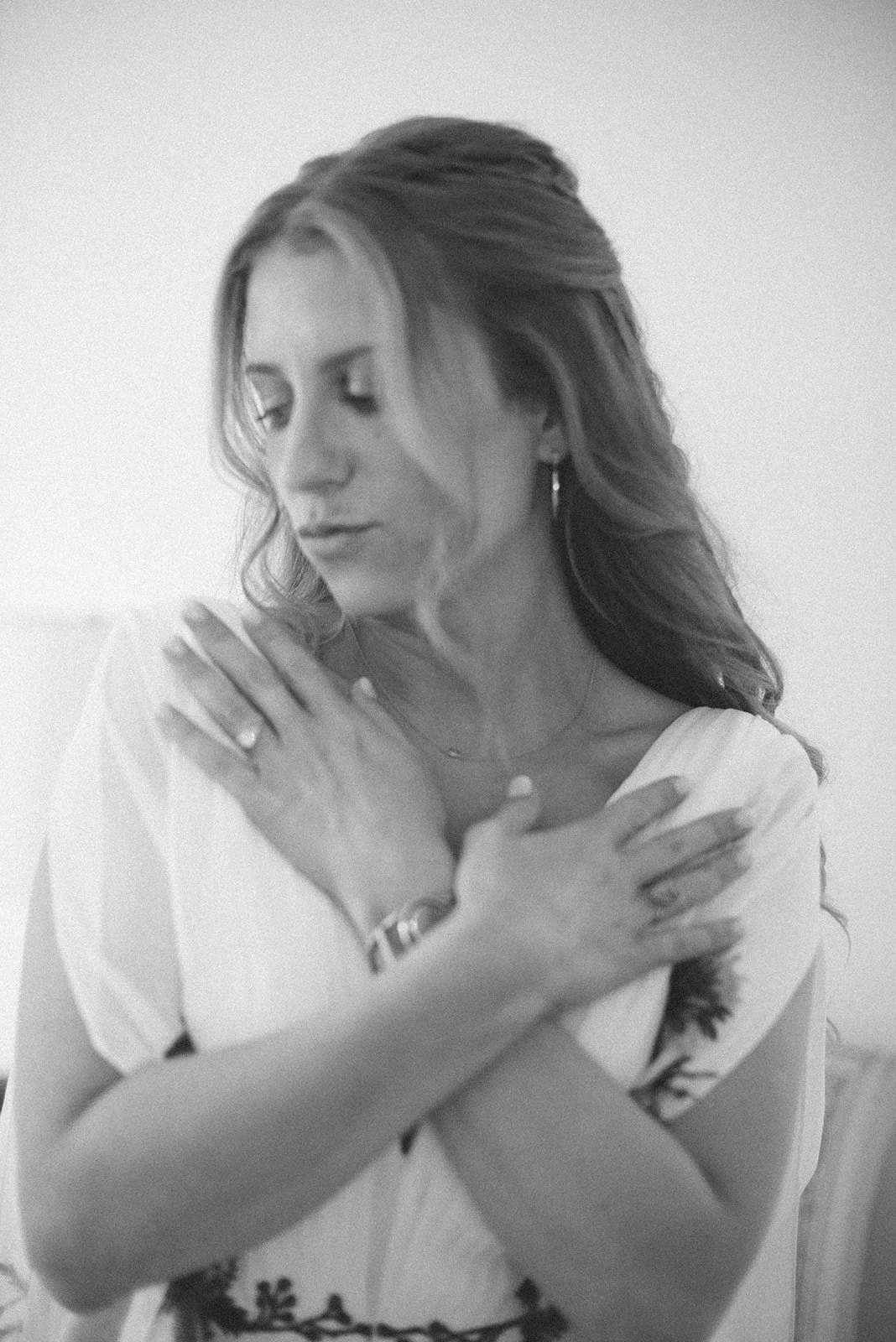 Black and White photo of Bride getting ready