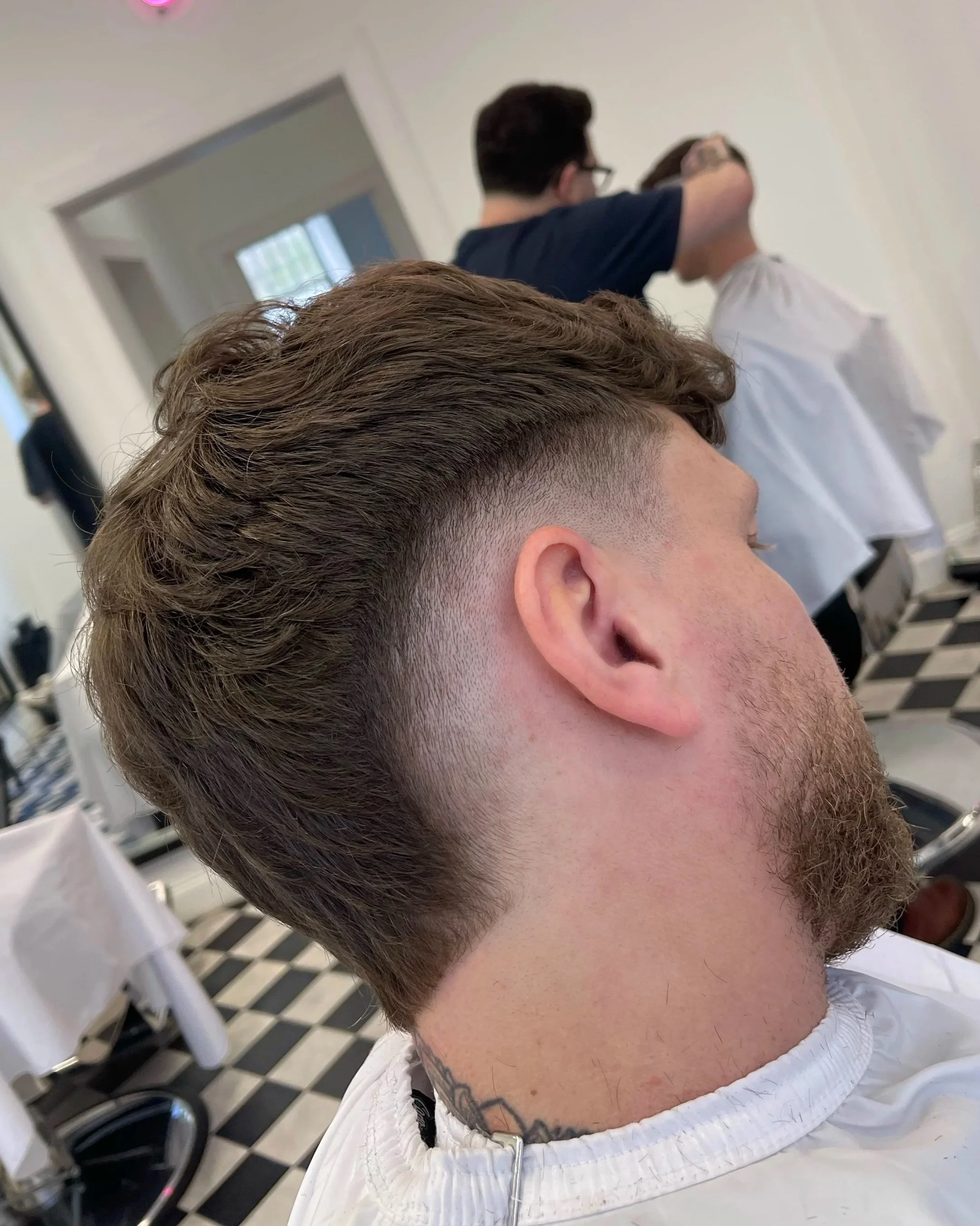 Burst fade haircut at Connoisseurs Barbershop in Leith, Edinburgh