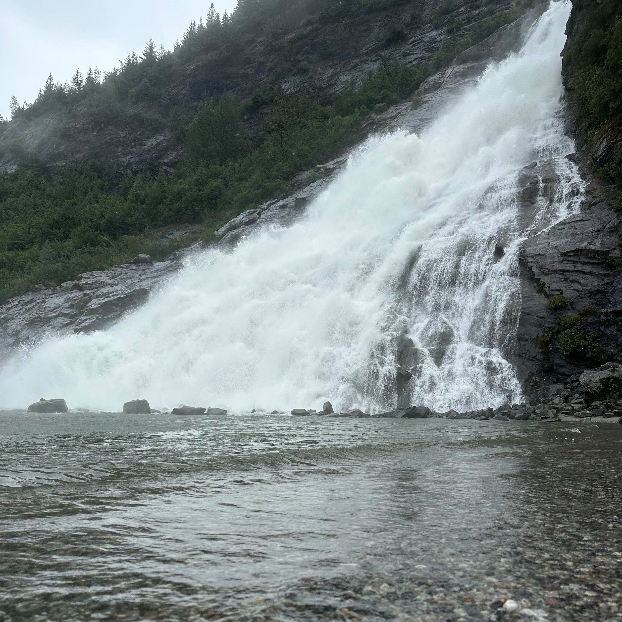 Nugget Falls, which can be accessed by Nugget Falls Trail starting from the Mendenhall Glacier Visitors Center.