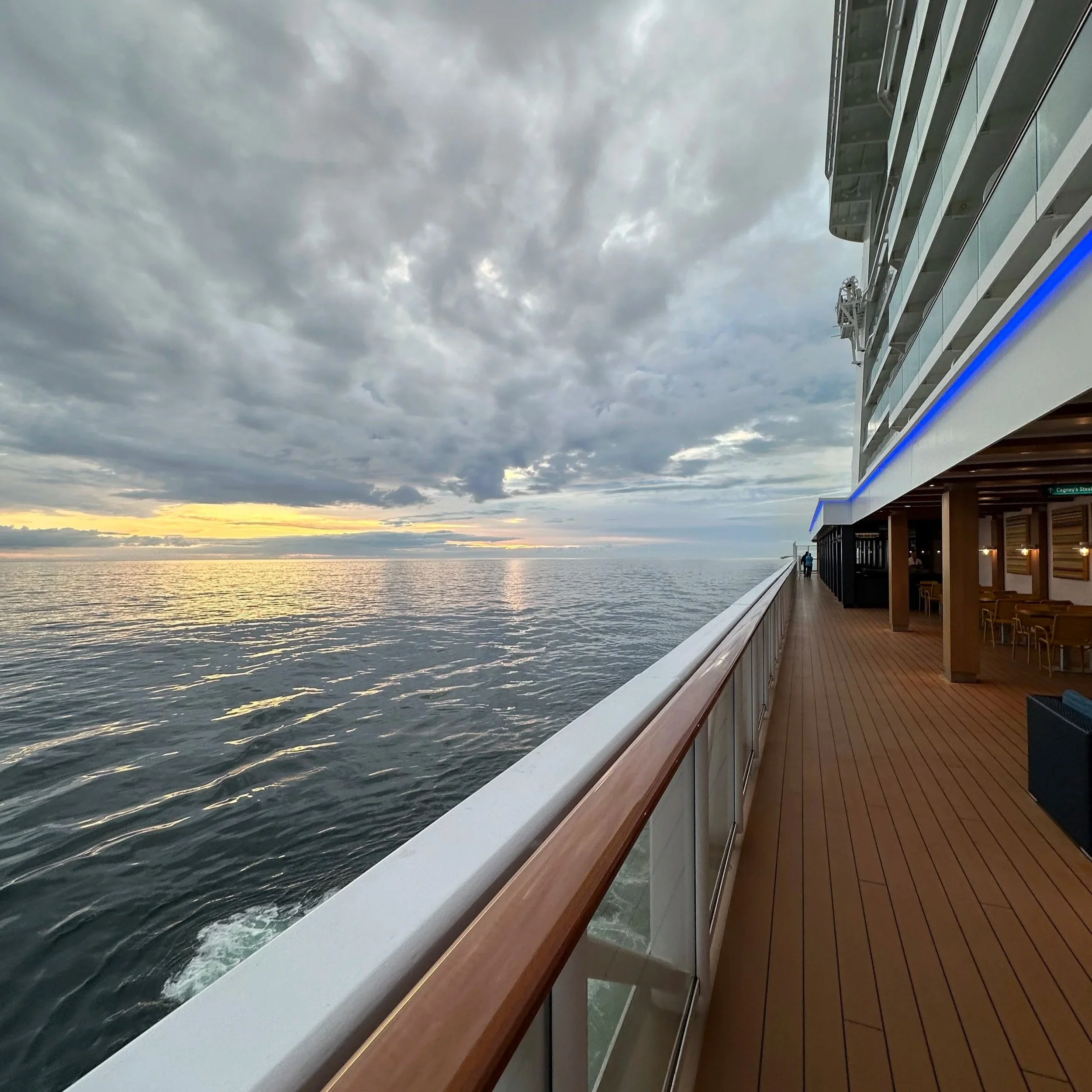 The Waterfront promenade on Deck 8 aboard Norwegian Bliss.