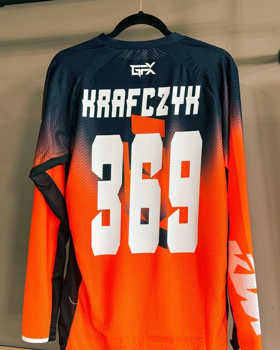 Sports jersey with the name KRAF Cz4X and the number 309 on the back.