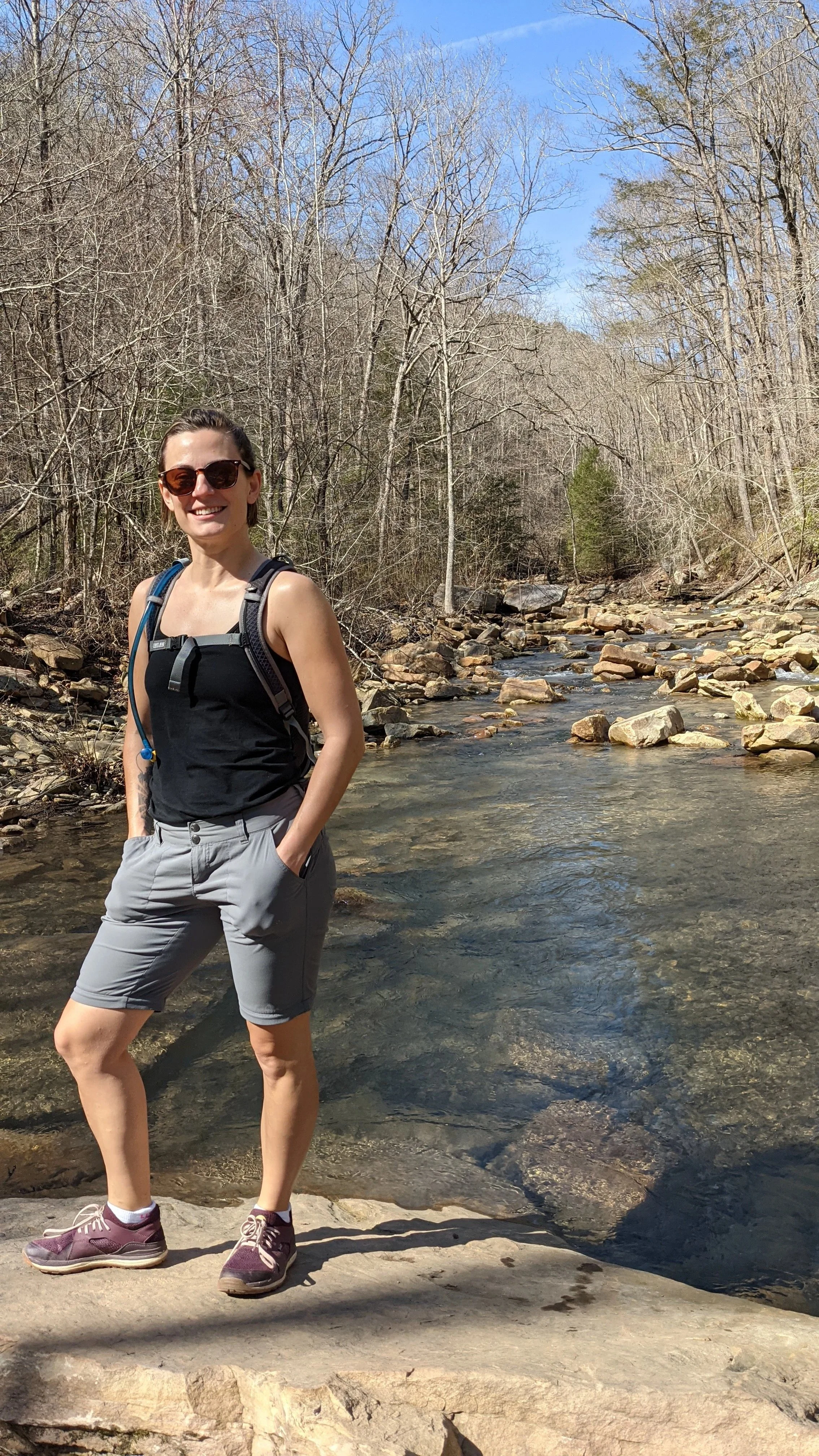 Rachel hiking by creek