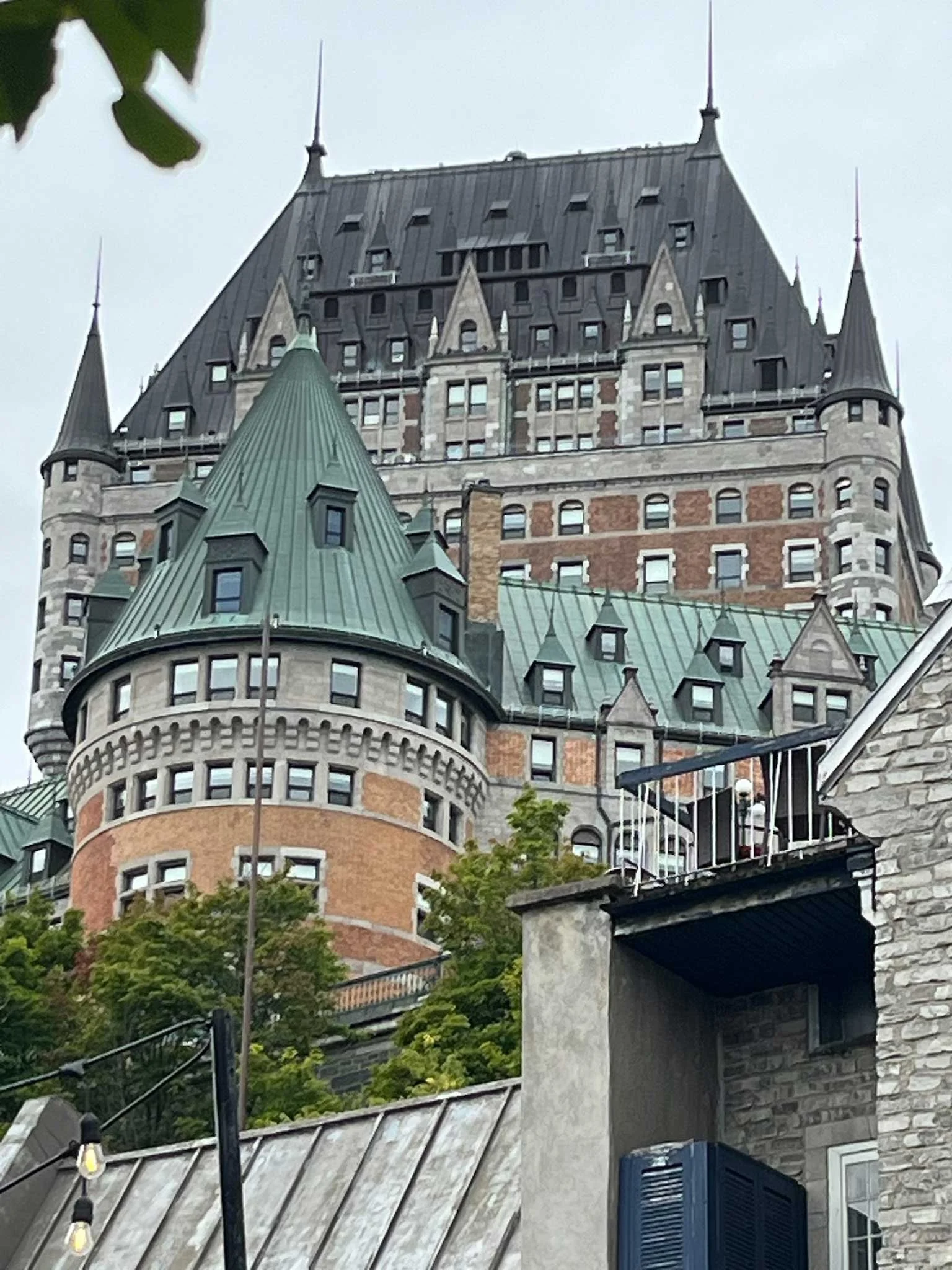  View of the historic Chateau Frontenac in Quebec City, seen from a lower vantage point.