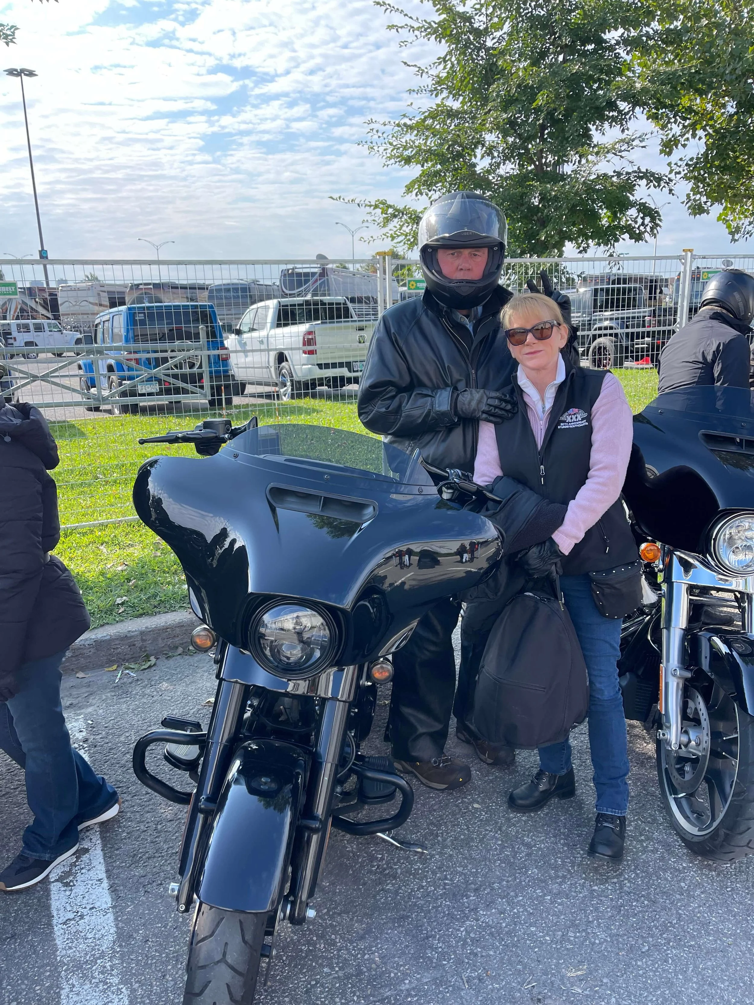 Two Bus n Bikers members posing for the camera. 
