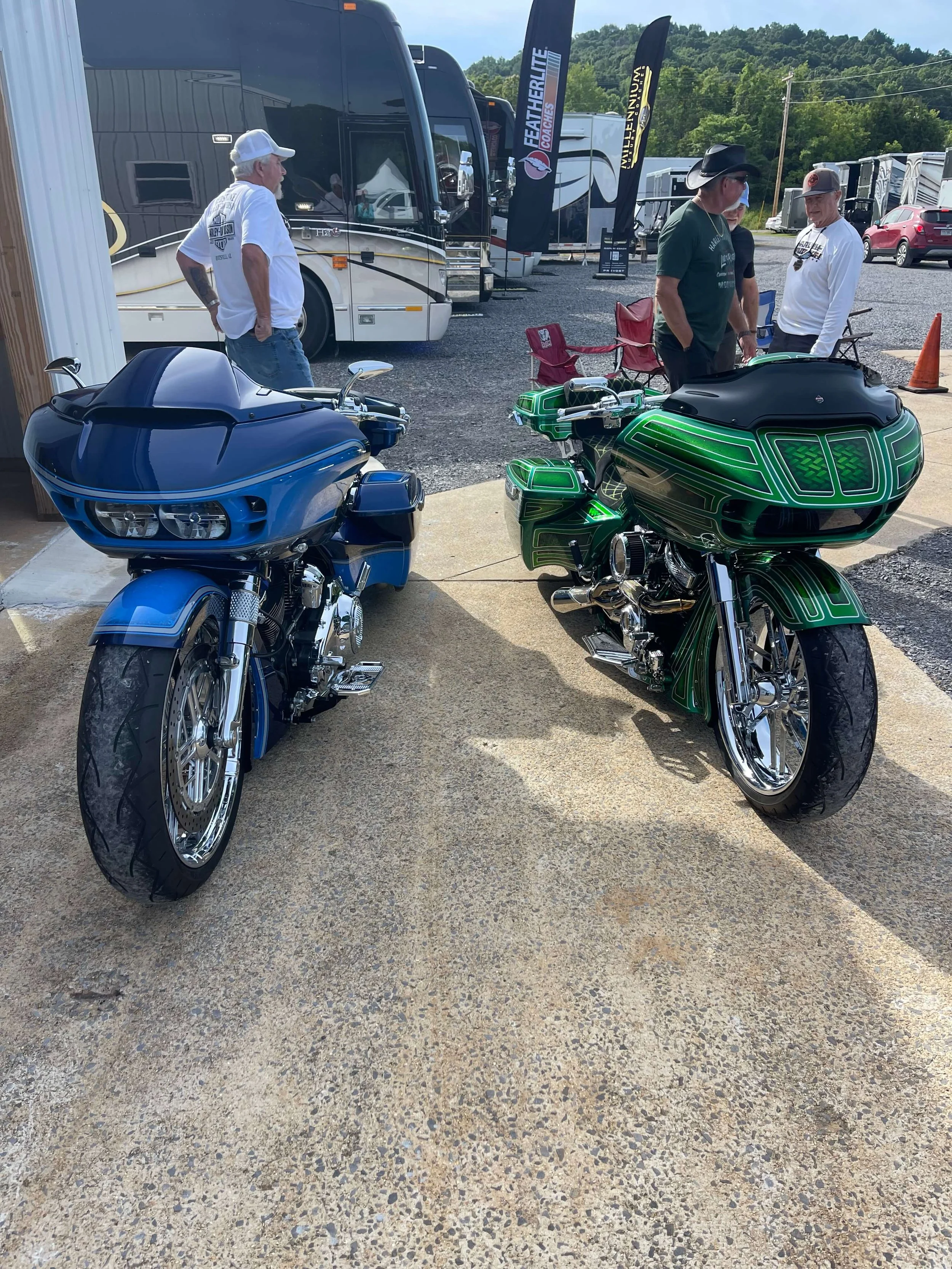 Two custom motorcycles with vibrant green and blue paint.