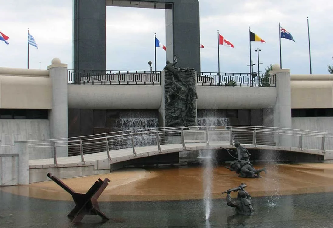 The National D-Day Memorial fountain with bronze soldier statues.