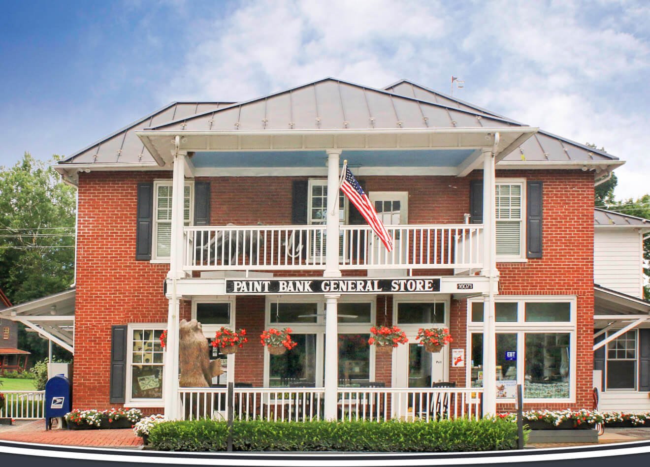 Riders resting after lunch at the restaurant inside the Swinging Bridge Store" inside the Paint Bank General Store, in Paint Bank, Virginia. 