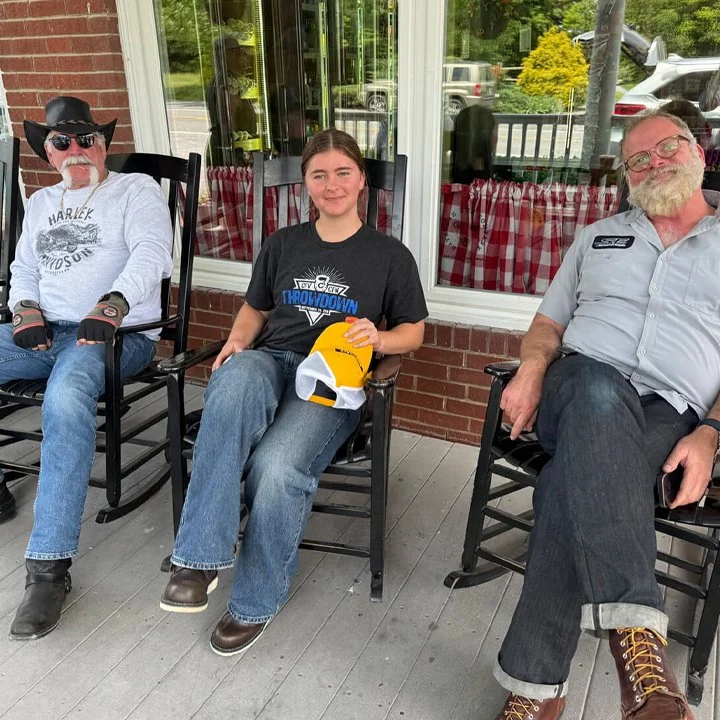 BnB members front porch lounging. 