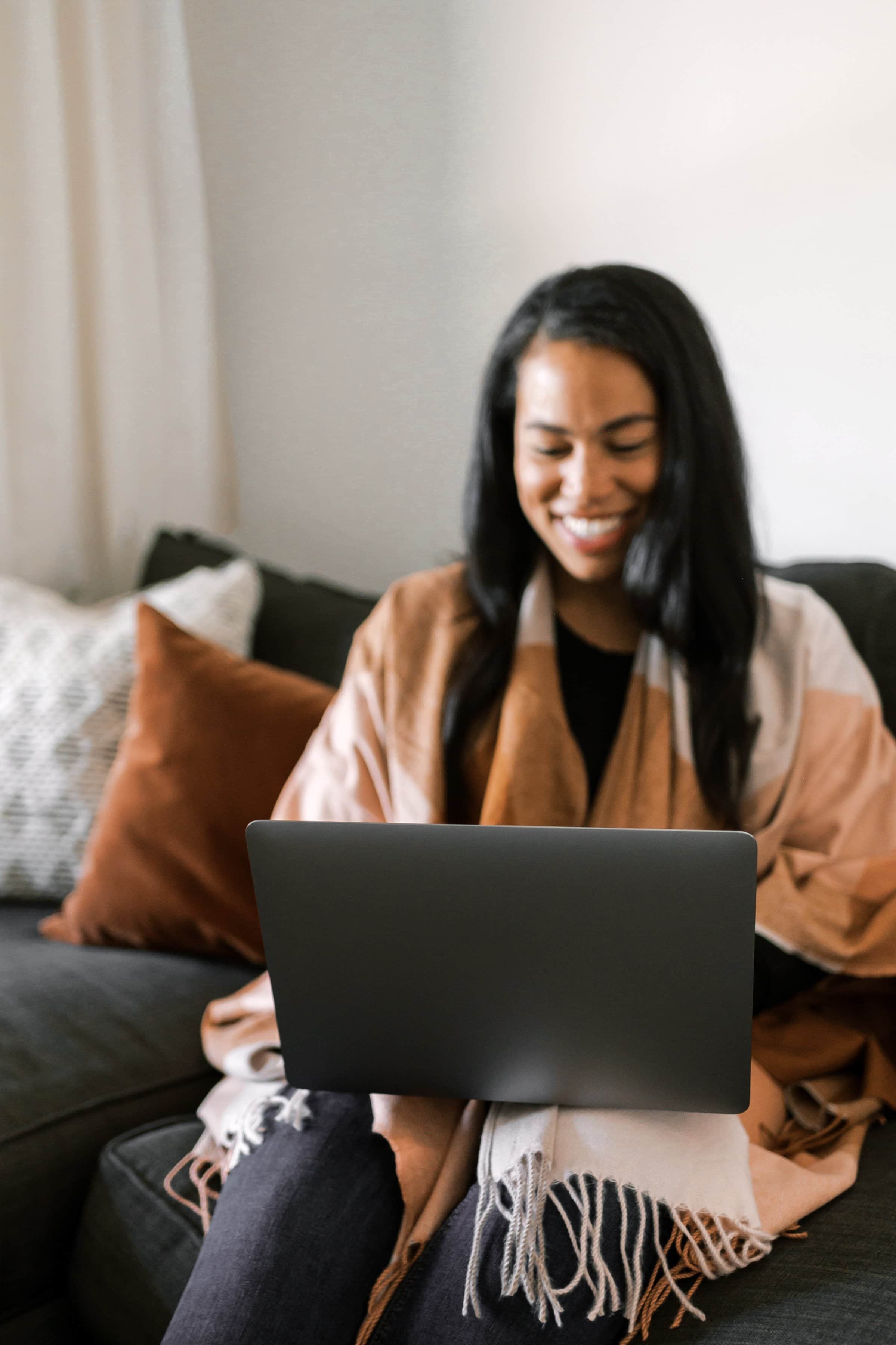 Black woman in virtual counseling session in Minneapolis Minnesota