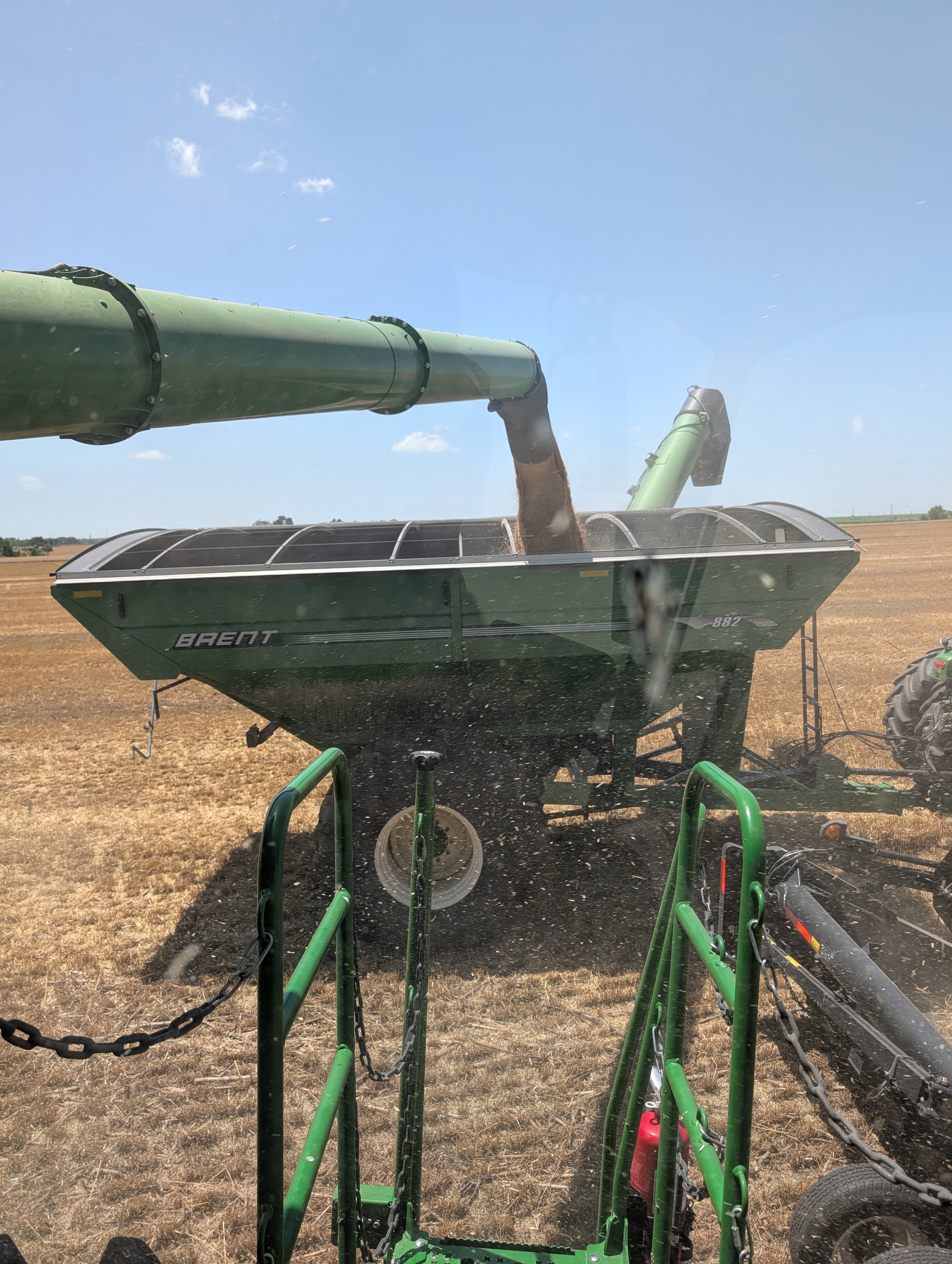 Combine Emptying into Grain Buggy - from Combine