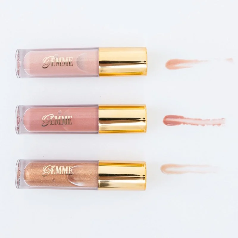 Three tubes of Gimme liquid lipstick with swatches on a white background, from light pink to darker nude shades.
