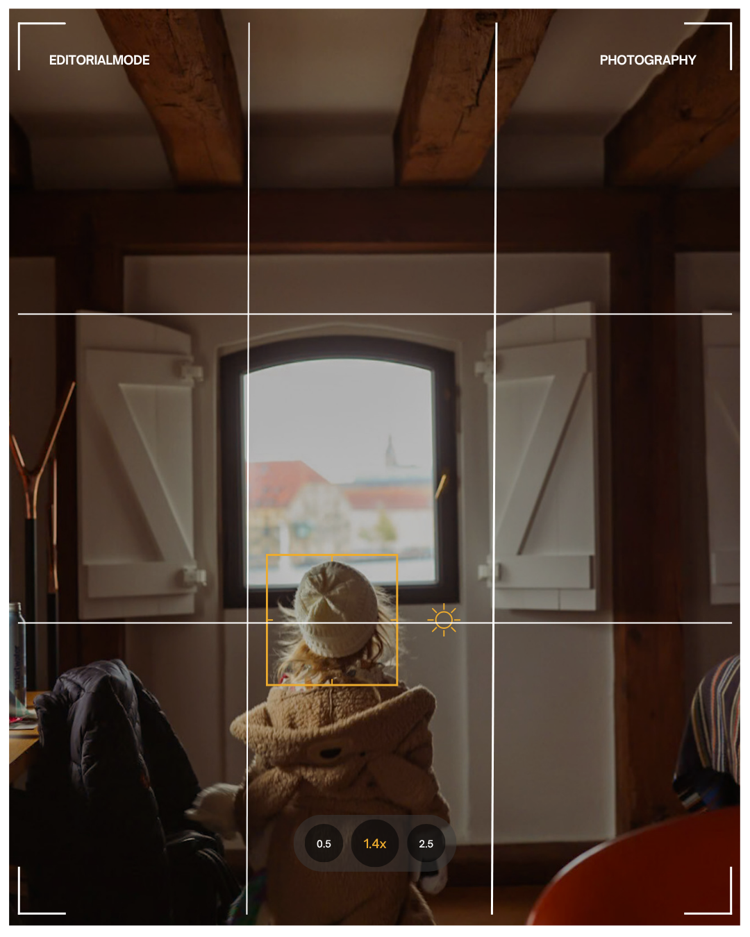 Indoor scene with a child wearing a knit hat and a warm coat, sitting by a window with open white shutters, overlooking a cityscape with red-roofed buildings and a church steeple.