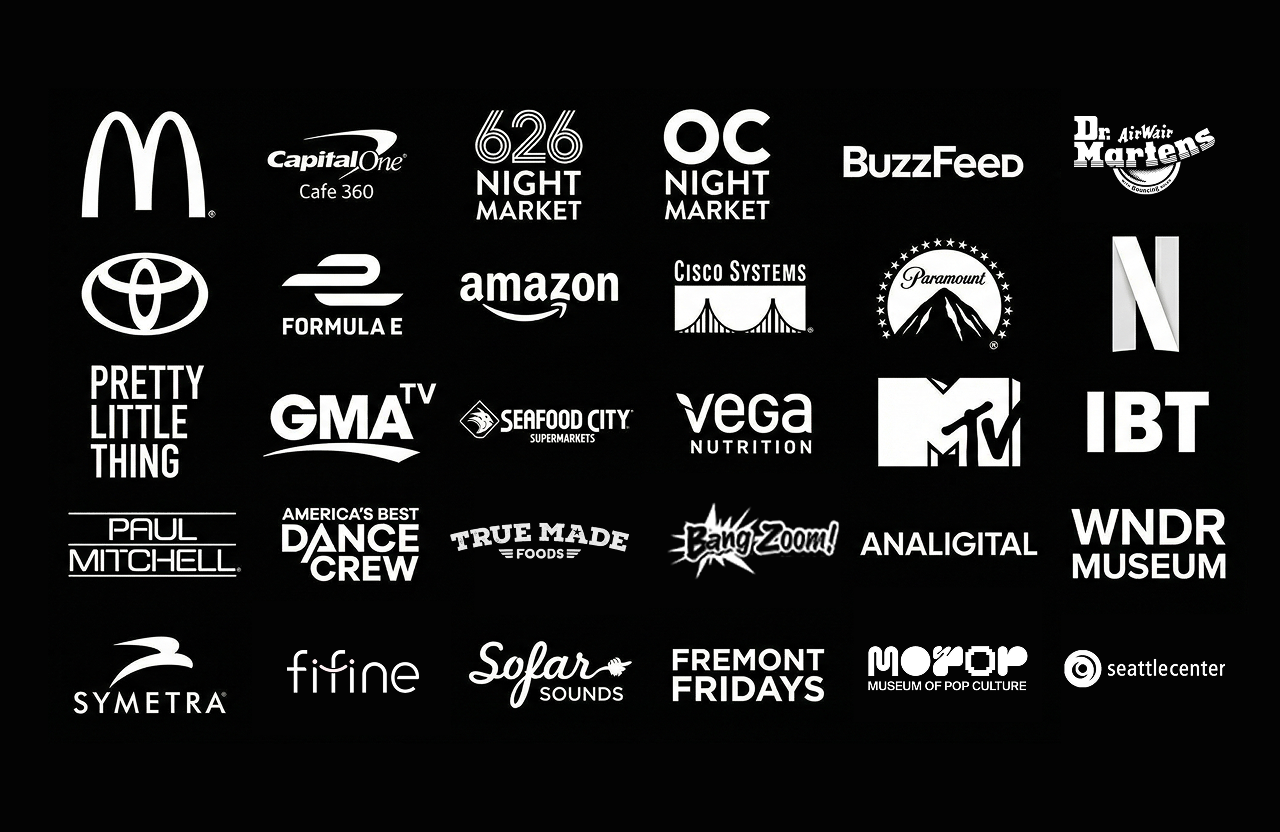 Collection of black-and-white logos of various companies and organizations arranged in a grid on a black background.