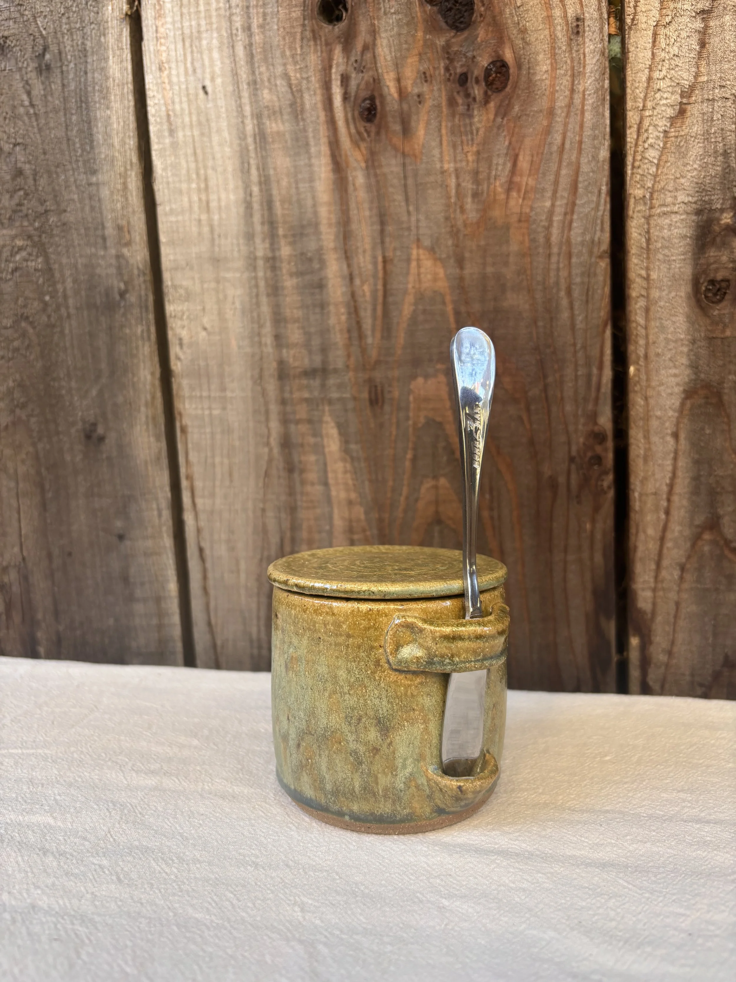 Butter keeper on tablecloth