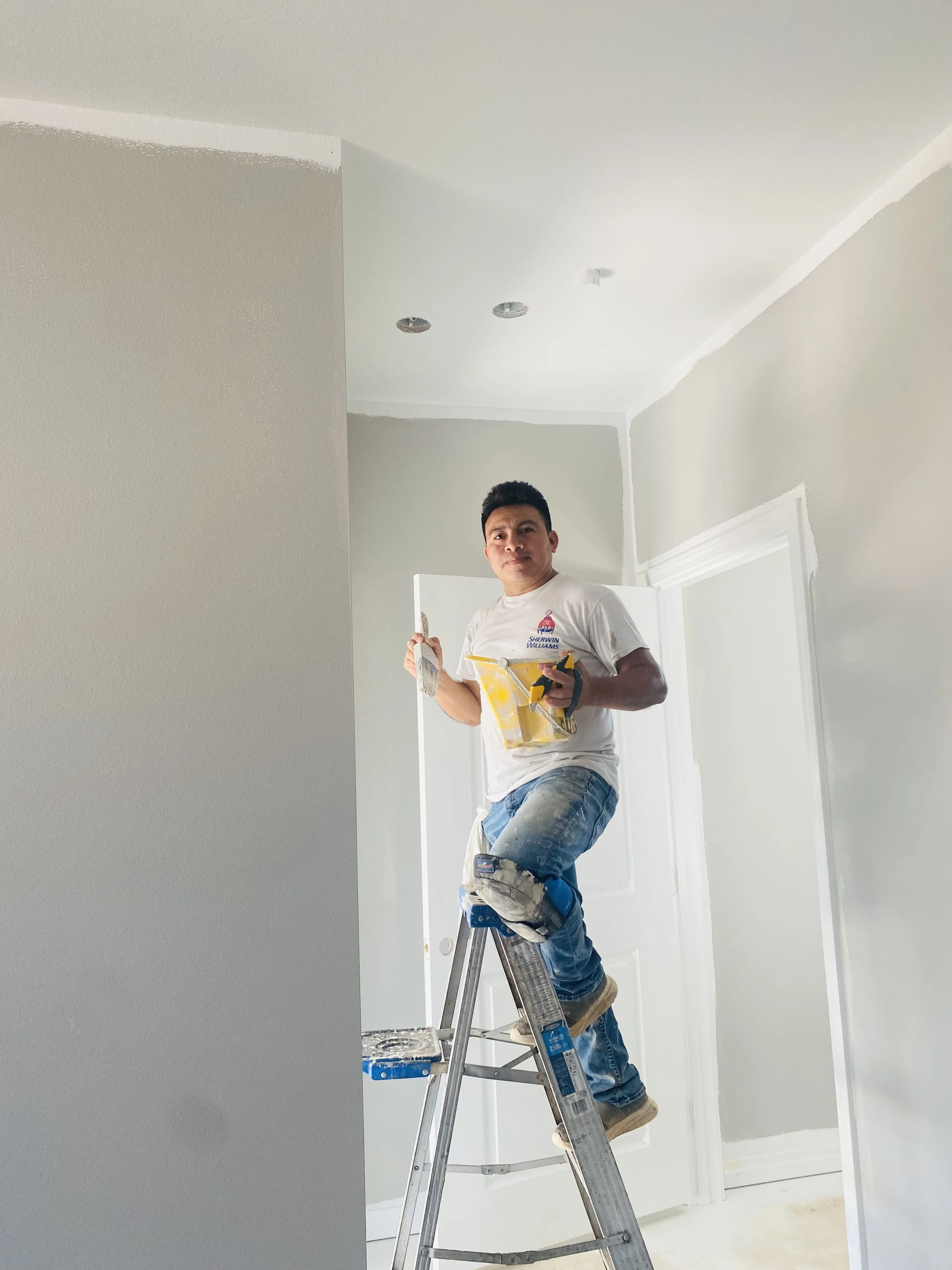 Francisco owner of Frank Painting Posing for as picture