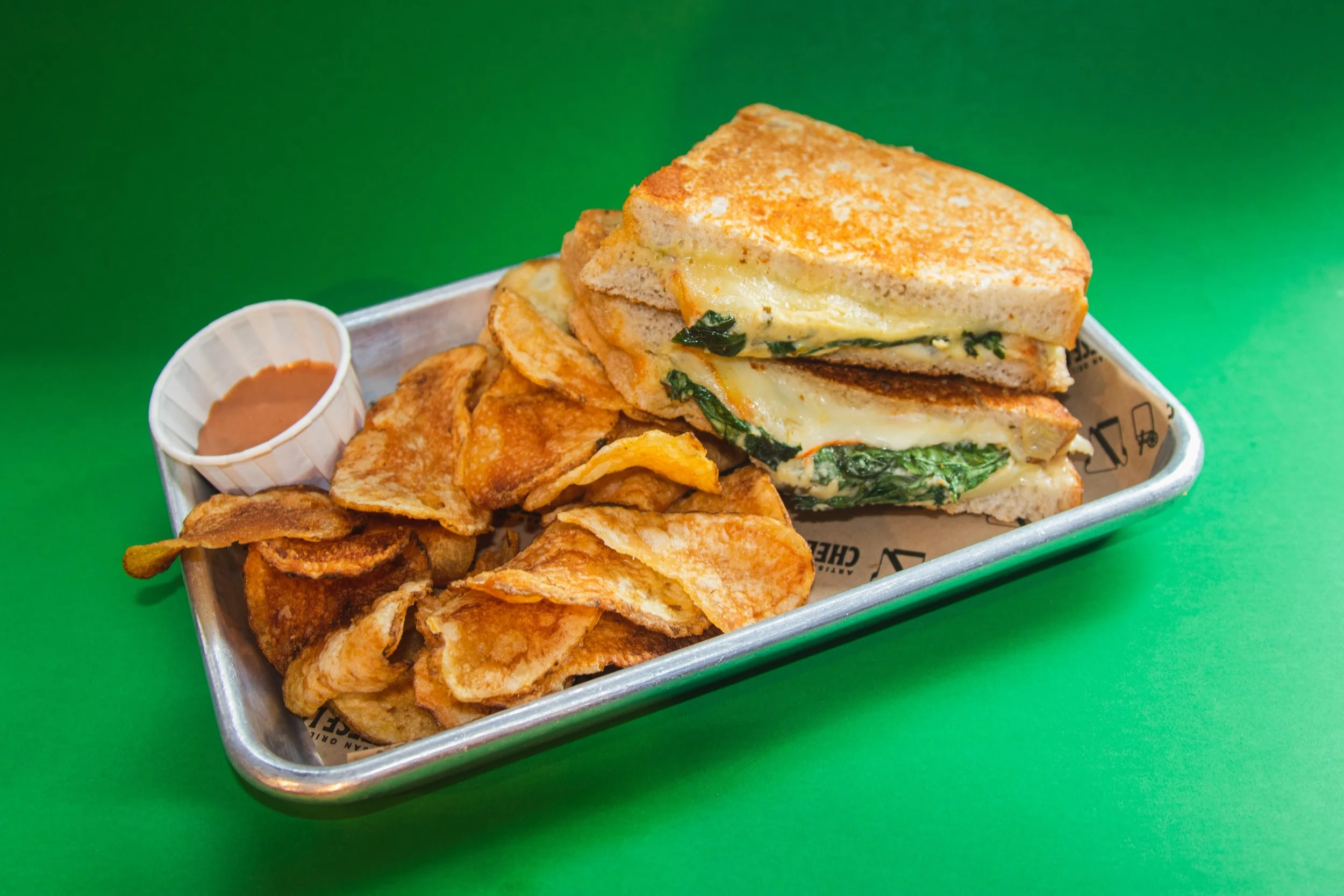 the okie dokie artichokie is hereeeee 💚

our spinach artichoke dip grilled cheese is available now at all locations!