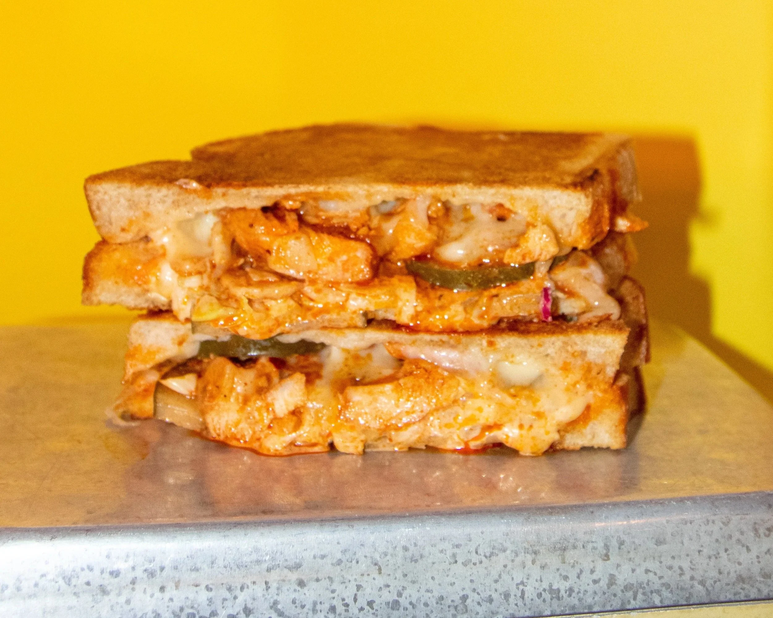 Our February special. Spicy Nashville Chicken. House-made Pickles. House-made Coleslaw. Pepperjack. Sourdough.