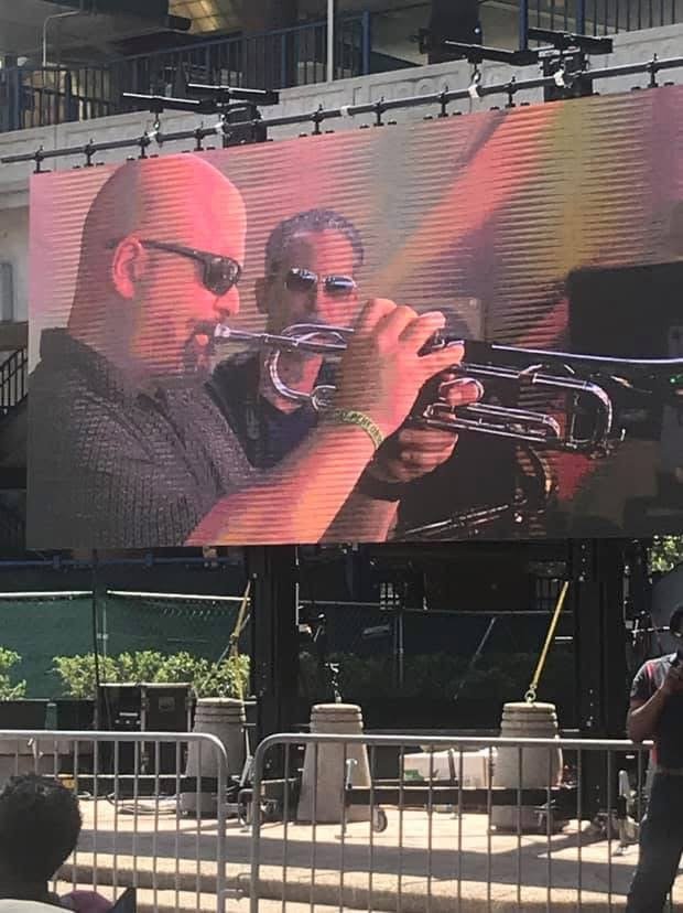 Jazz Festival Trumpet Player performance big screen