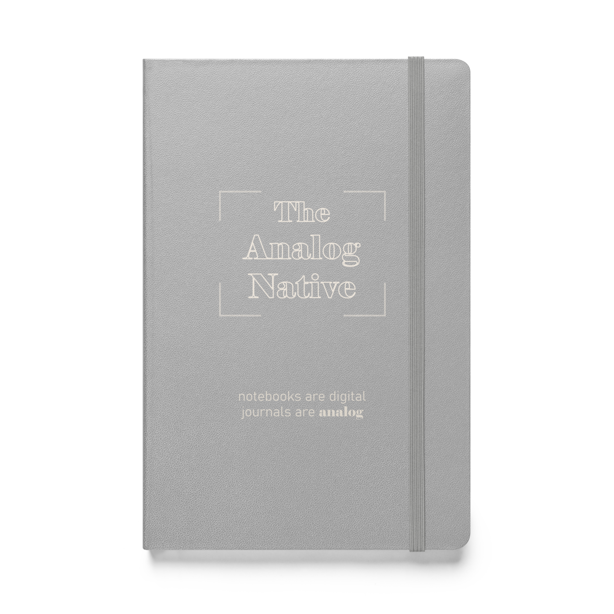 Silver hardcover journal with the title 'The Analog Native' and the subtitle 'notebooks are digital, journals are analog' embossed on the cover.