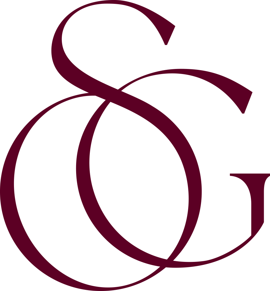 Close-up of the interlocking letters G and S in a dark red color.