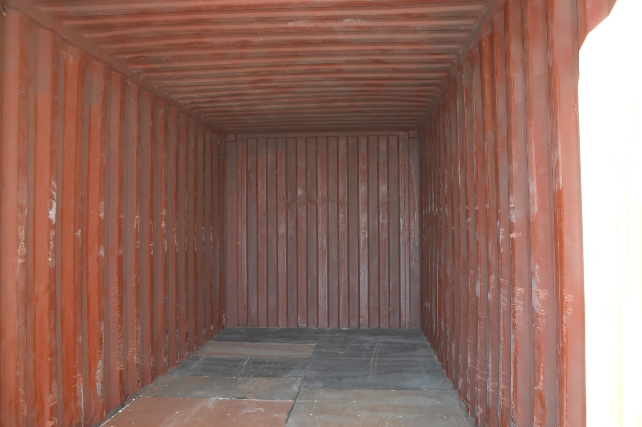 Interior of a used 20 ft storage container with steel walls and solid flooring, ideal for equipment or jobsite storage in Fort Worth, Texas.