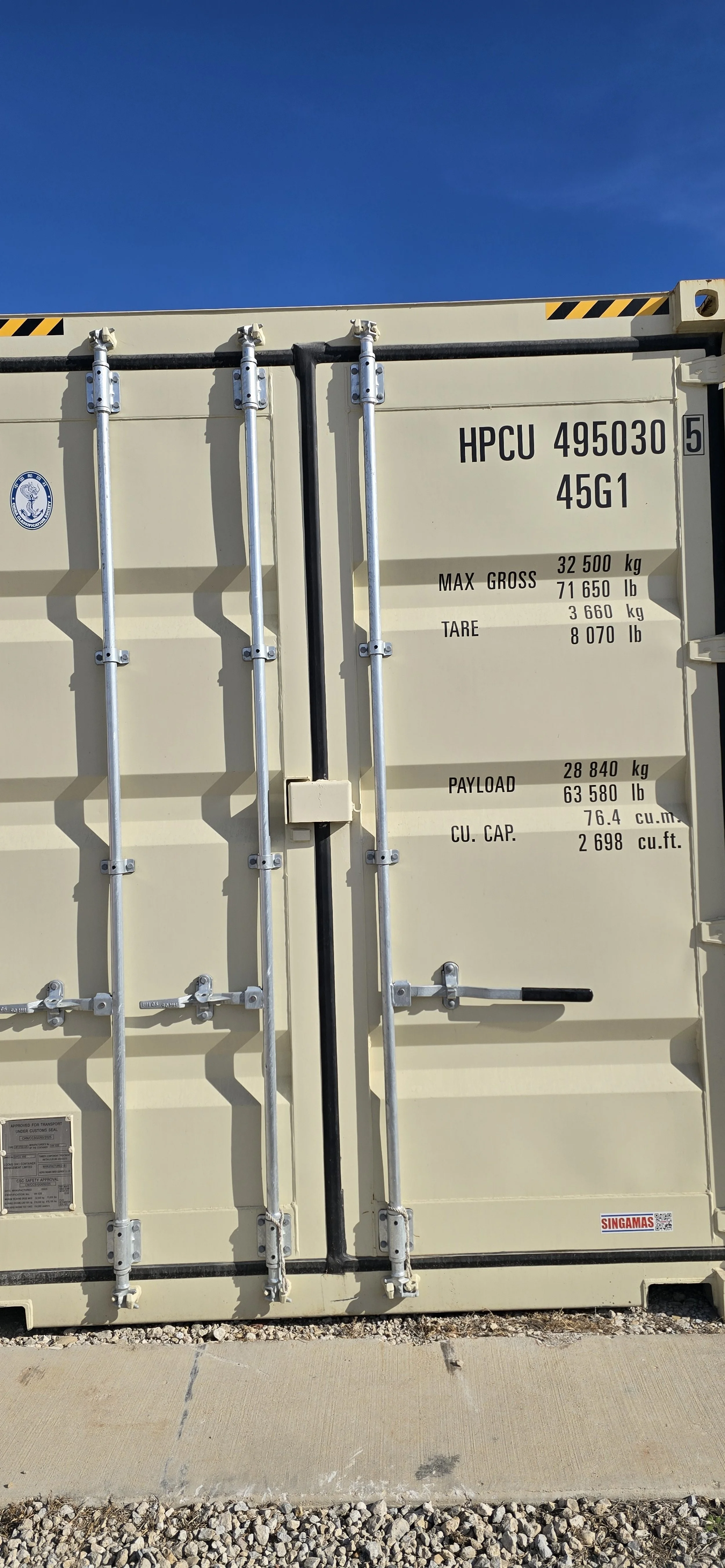 Open door view of a New/one trip 40 ft storage container in Fort Worth, TX showing clean steel interior and solid wood flooring.