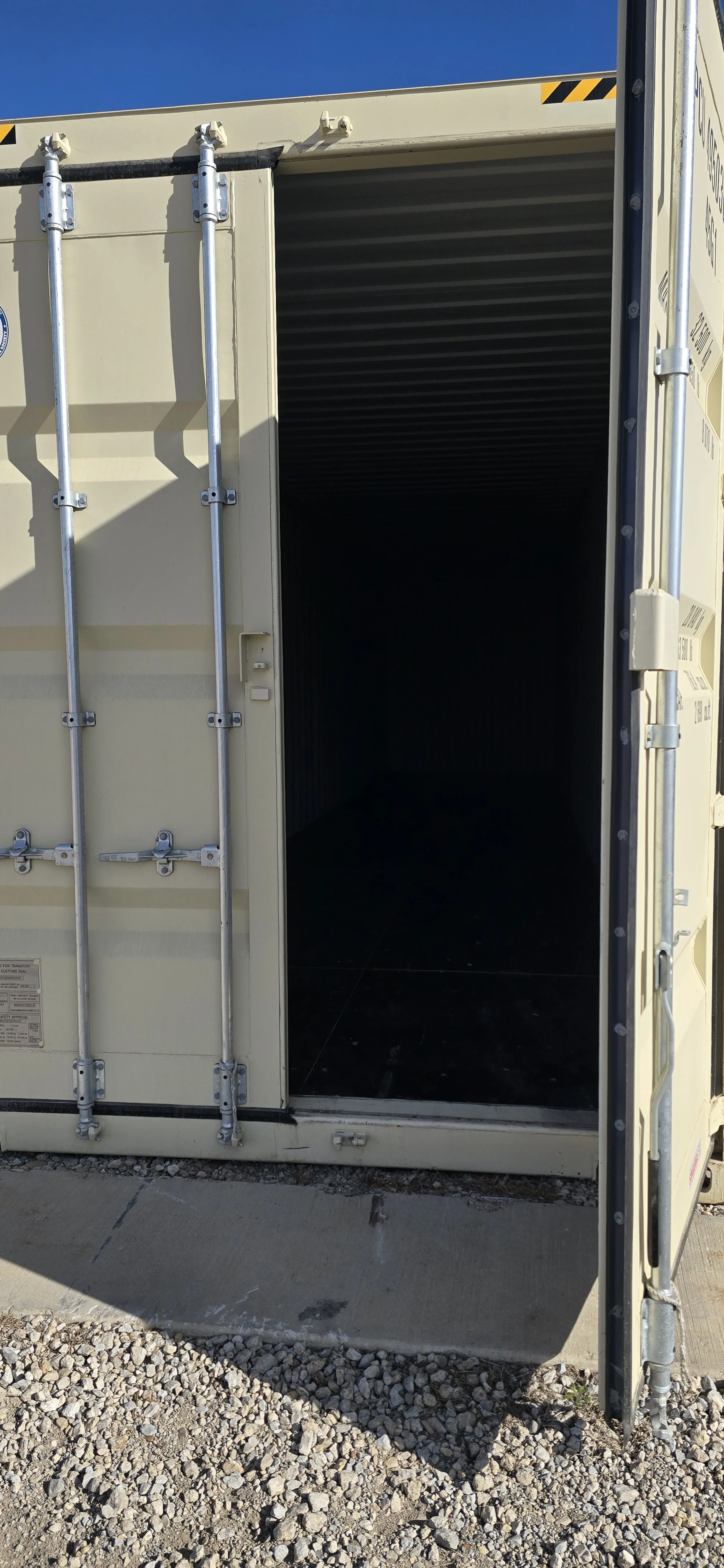 Close-up of double door locking mechanism on a New/one trip 40 ft steel storage container in Fort Worth, TX, showing durable hardware and solid construction.