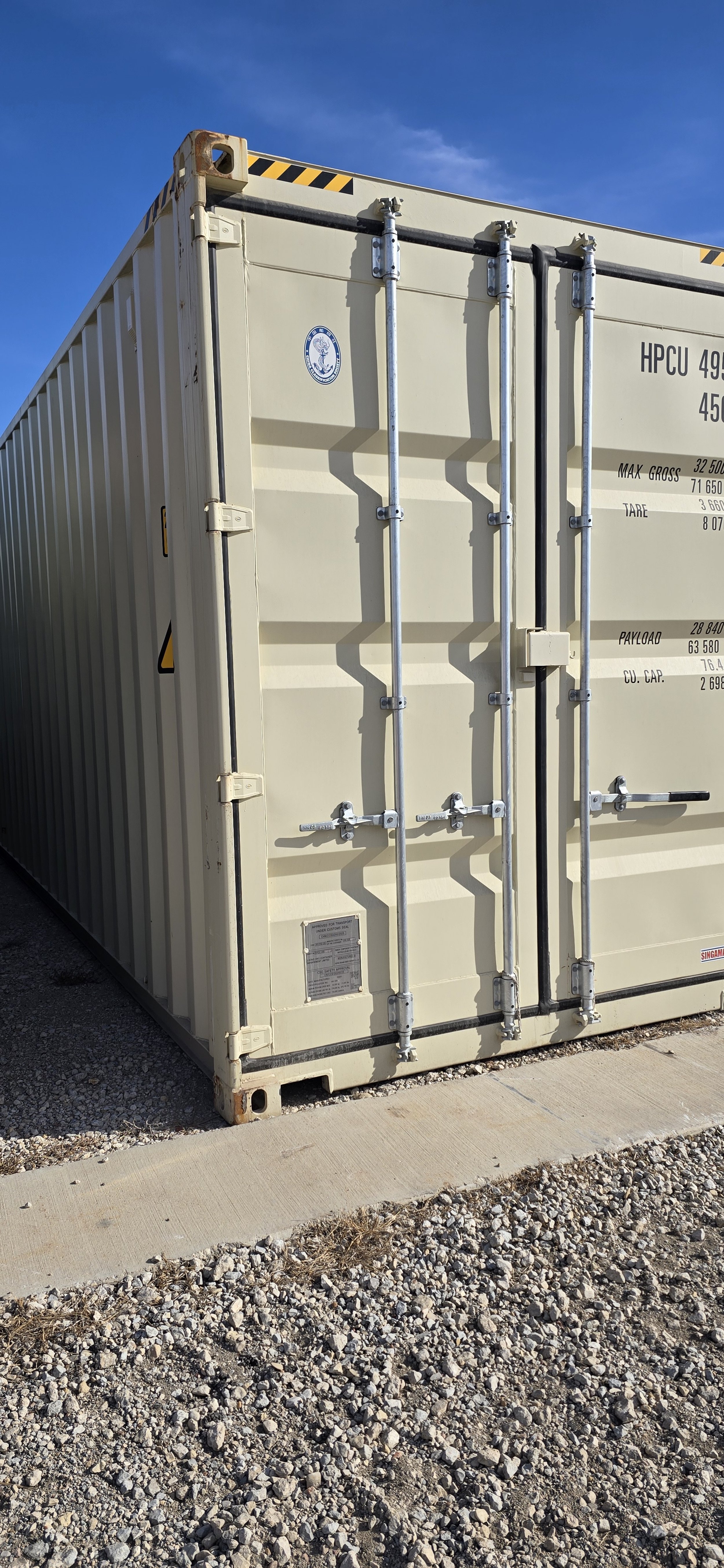 New/ one trip 40 ft storage container in Fort Worth, TX with steel exterior, double swing doors, and visible corner casting. Wind and water tight condition.