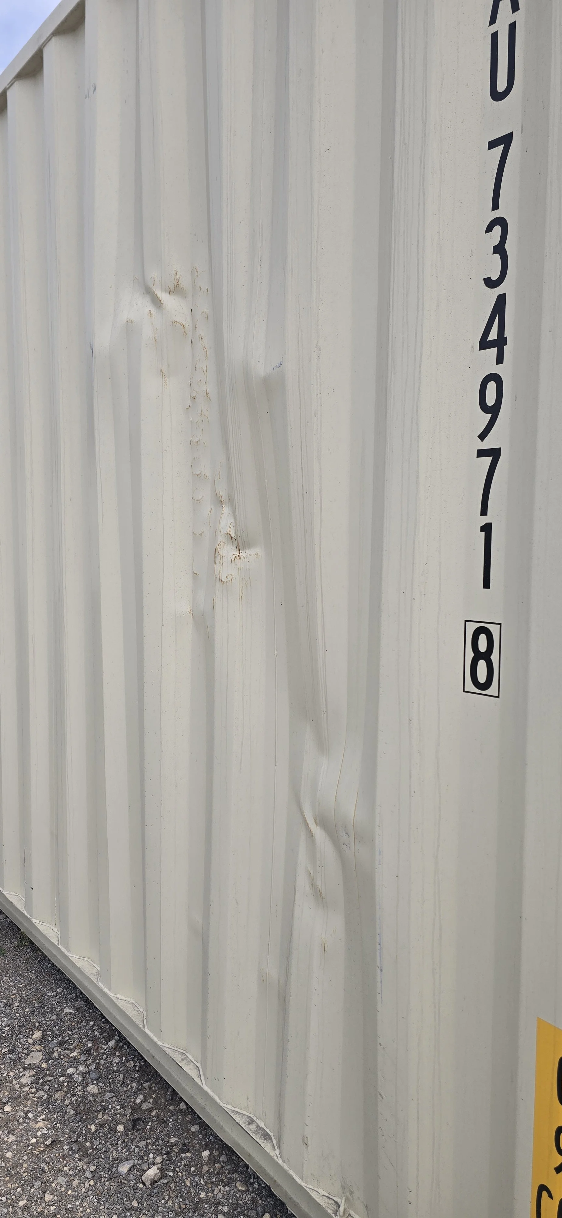 Minor damage on left wall of 40 ft shipping container