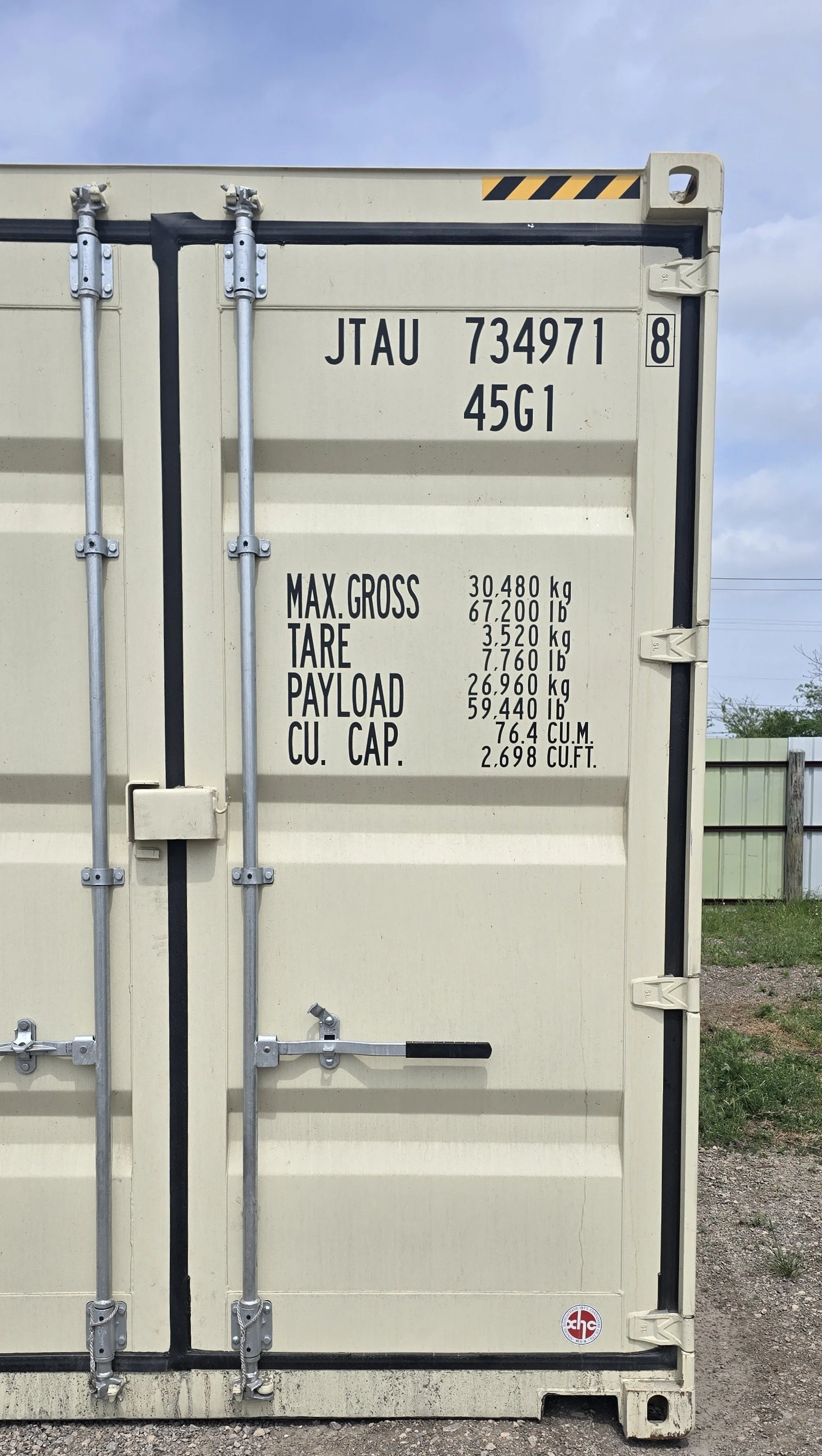 Close-up of easy open door hinges and locking bars on 40 ft shipping container